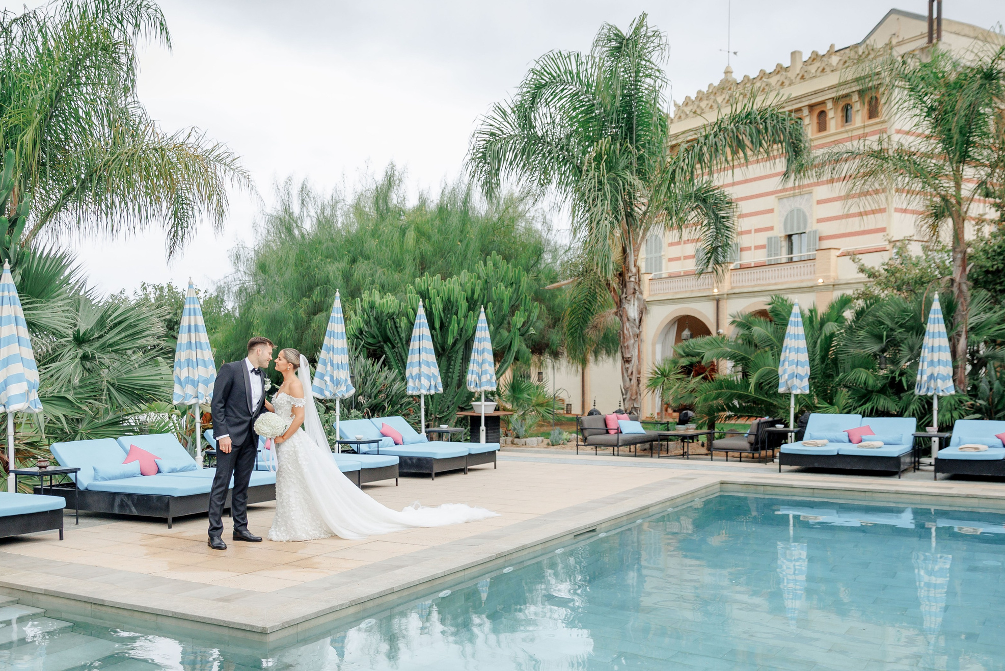Elegant outdoor wedding ceremony in Barcelona, showcasing the city's iconic architecture