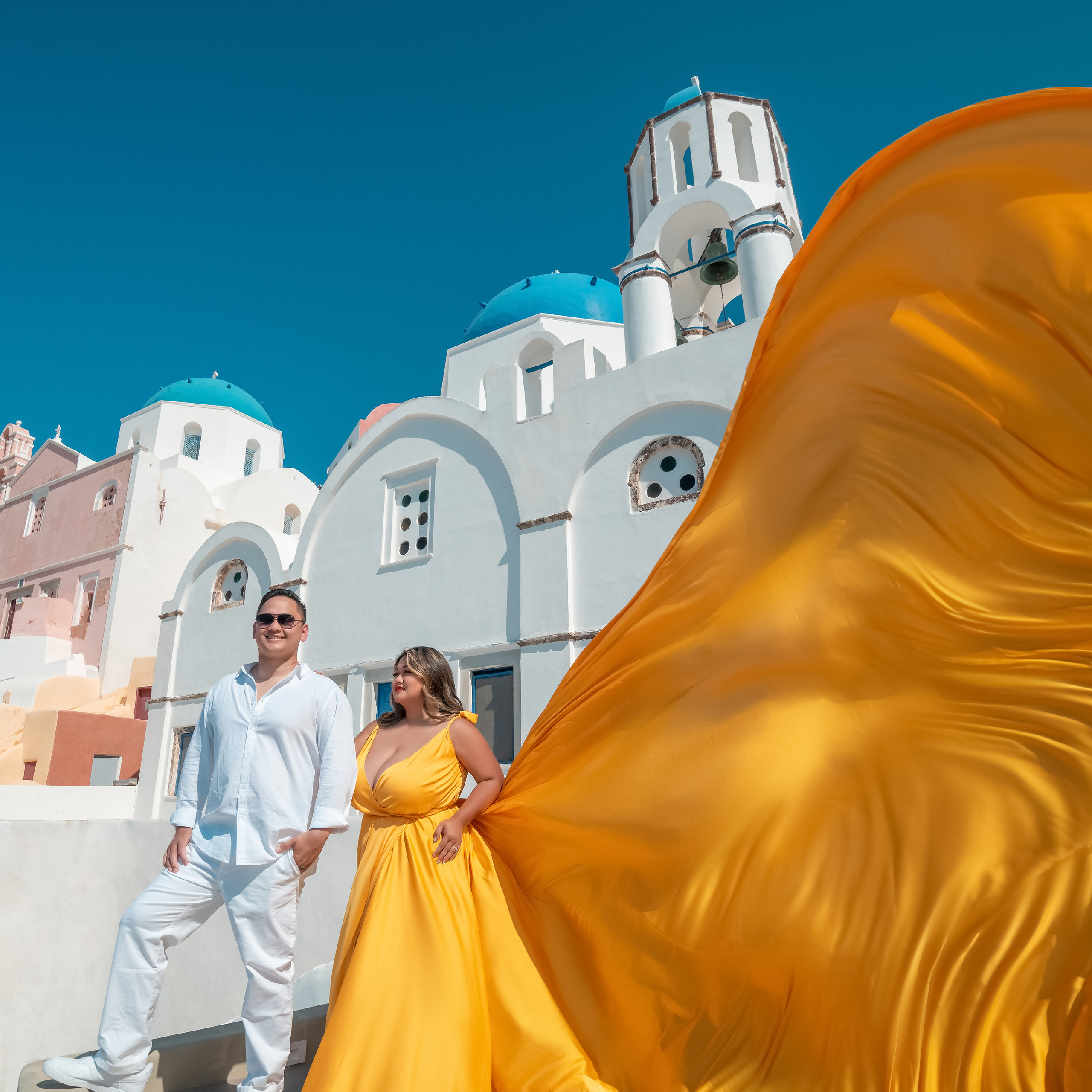 Santorini Flying Dresses Rental catalog price. Photographer in Santorini SokoLOVE Alex| Flying Dress Santorini