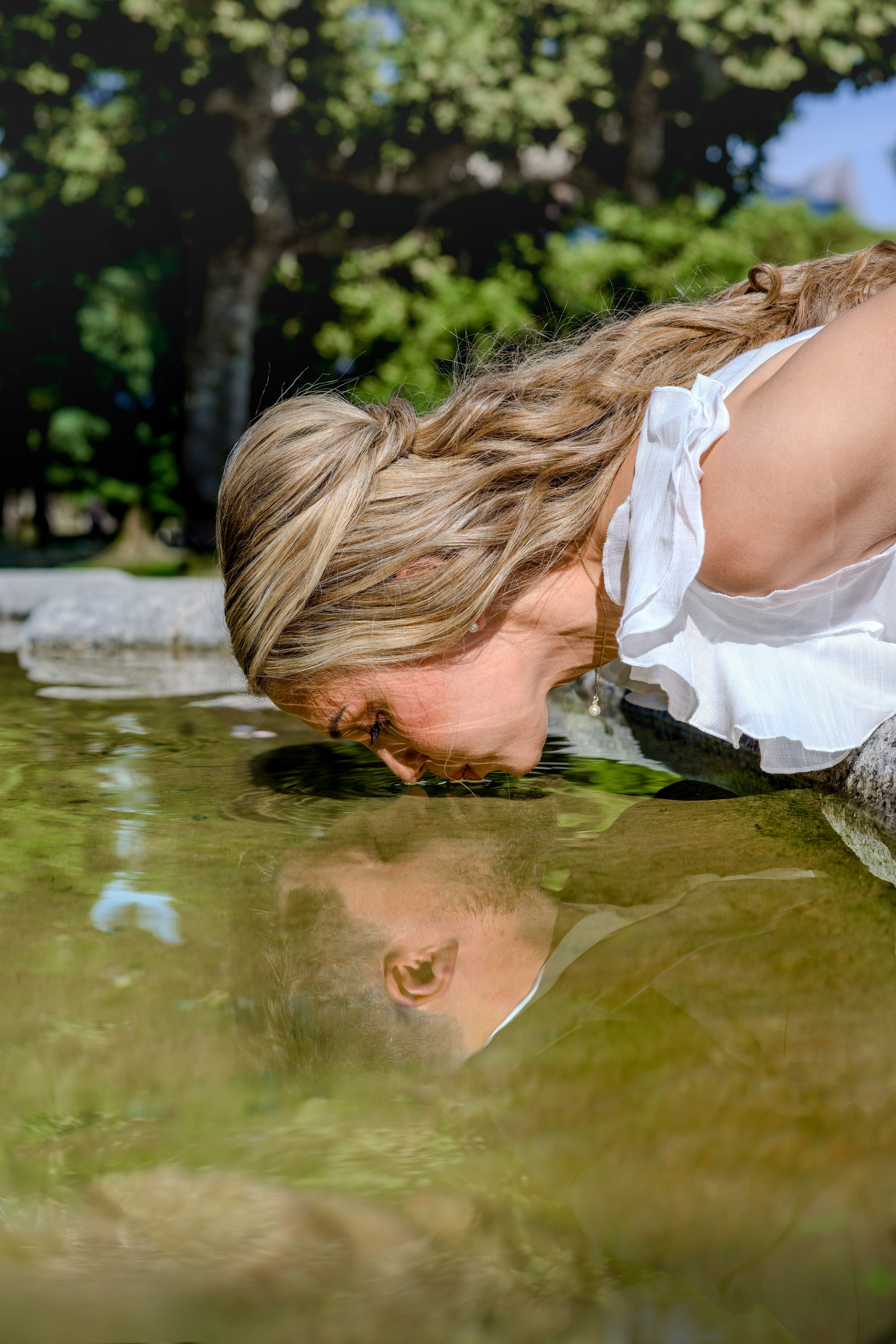 Couple sharing love at Villa del Balbianello, Como.