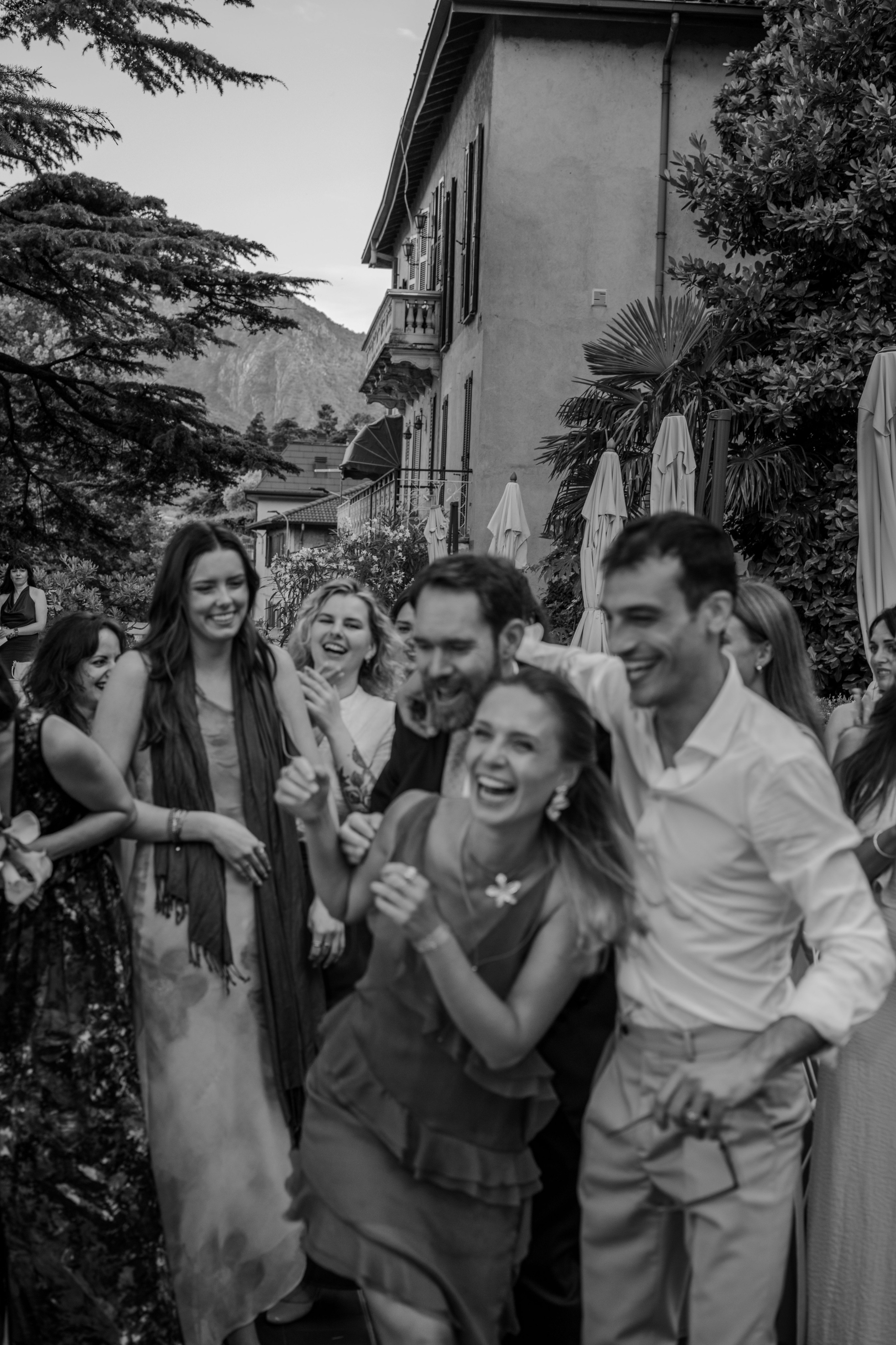 Couple sharing vows in a romantic outdoor setting.