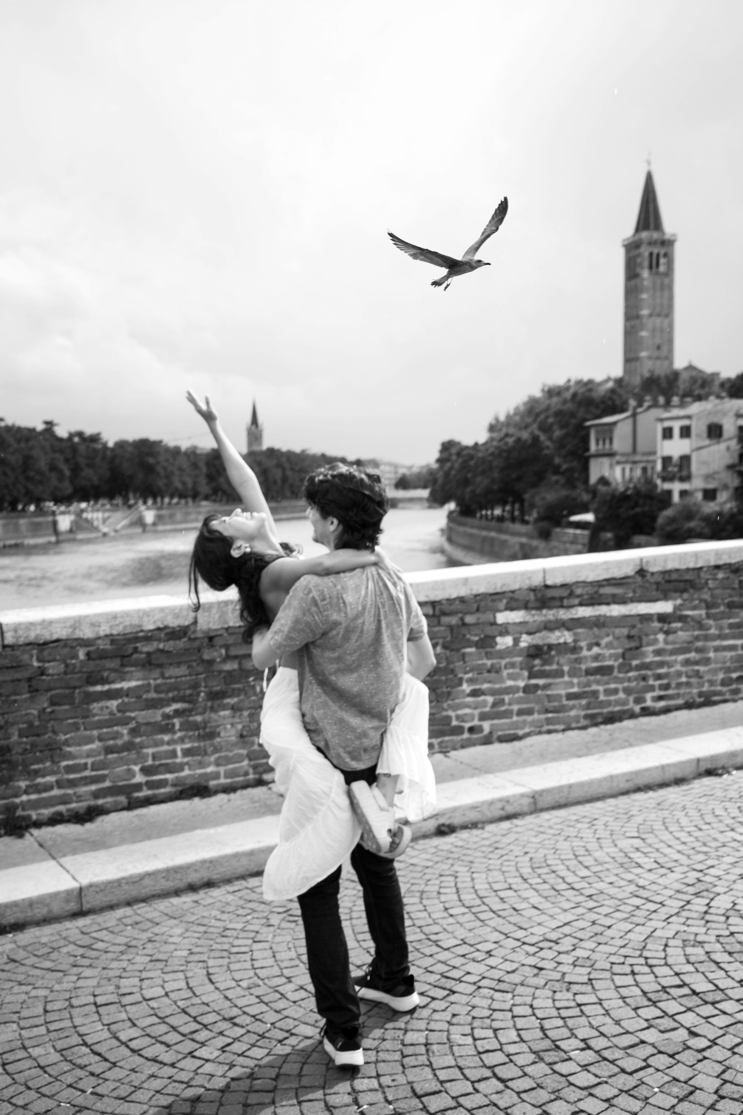 Couple enjoying proposal photo session in Verona.