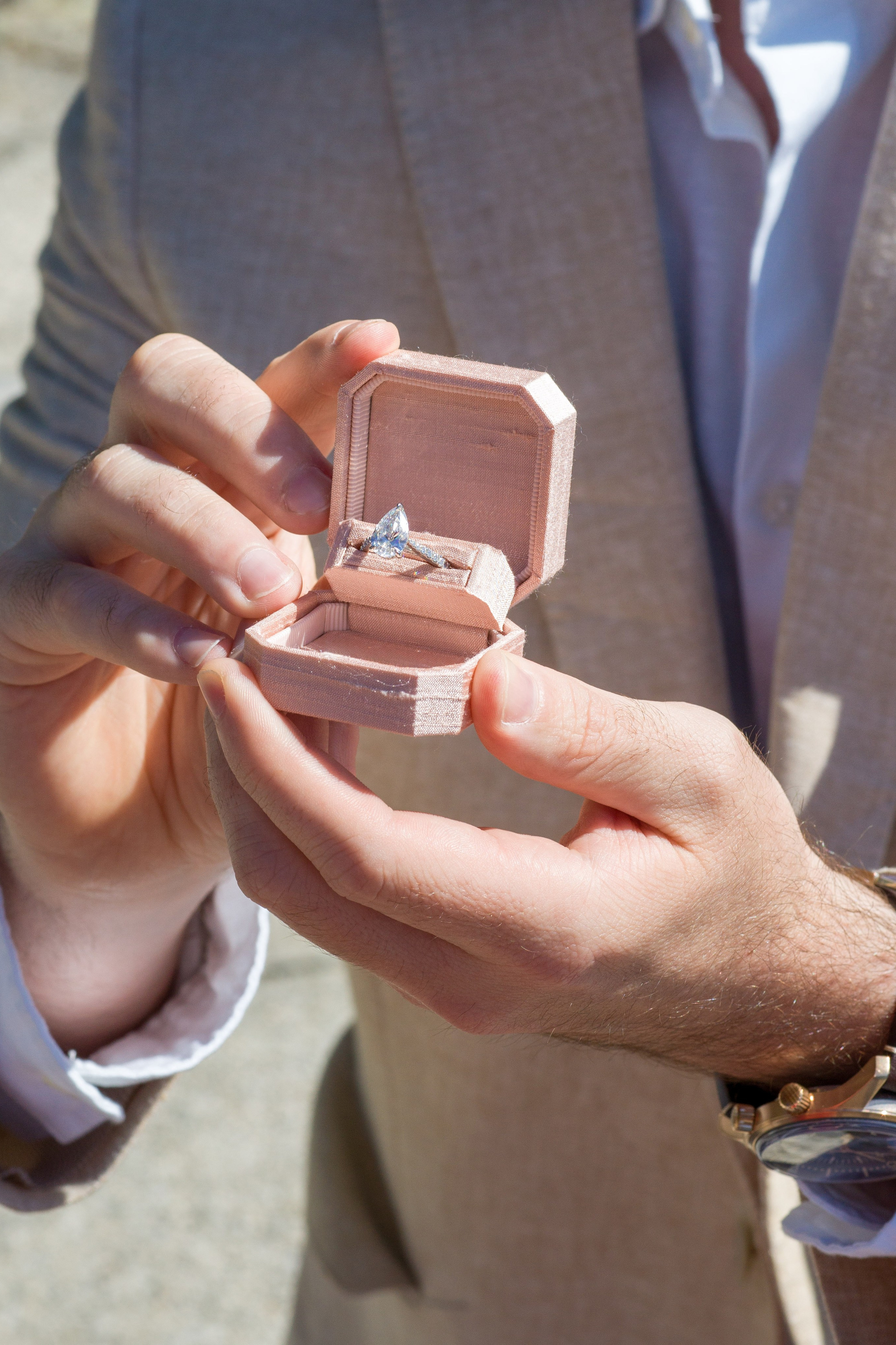 Romantic couple standing by the lake during their engagement shoot in Villa Melzi.