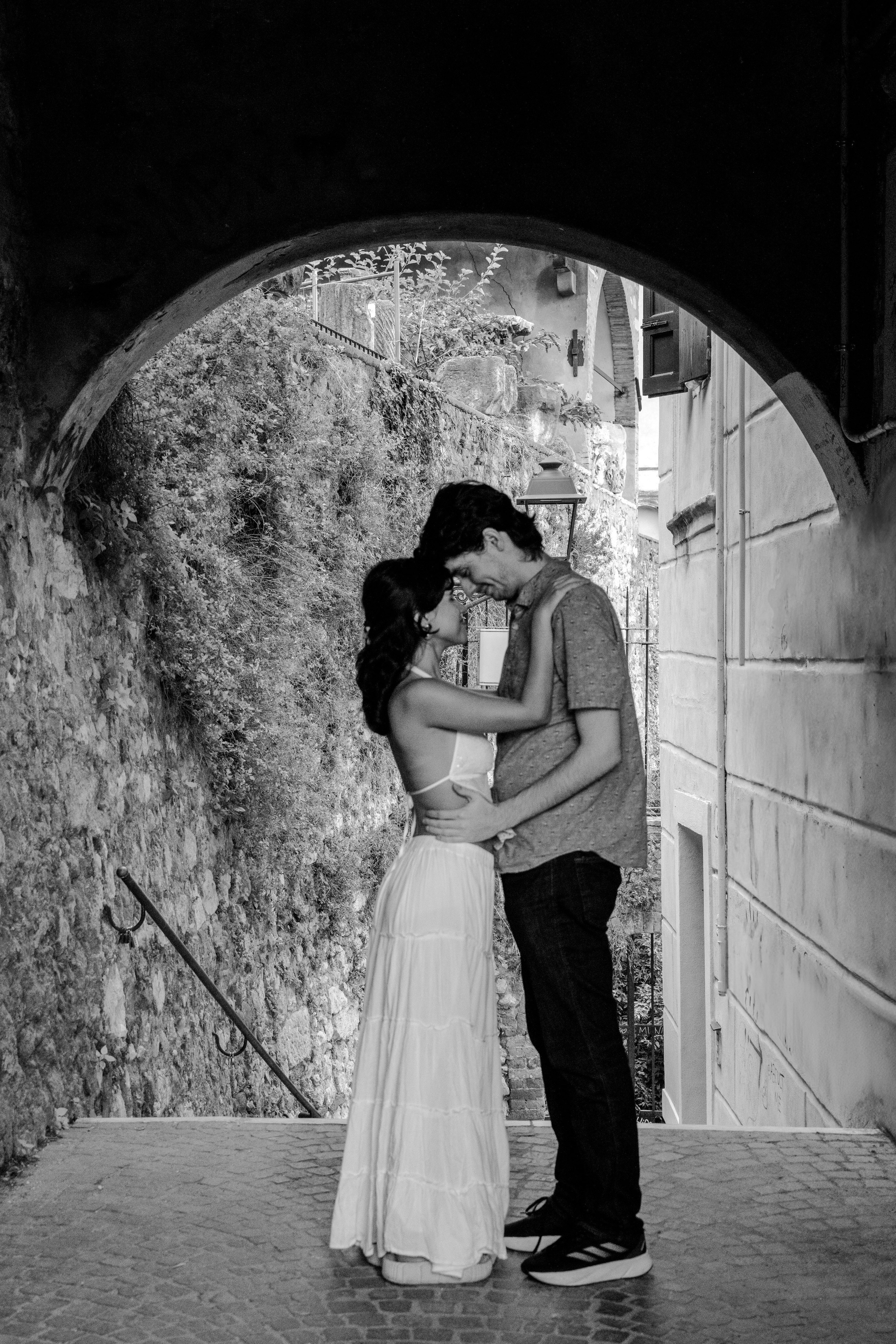 Couple posing for proposal photos in Verona.