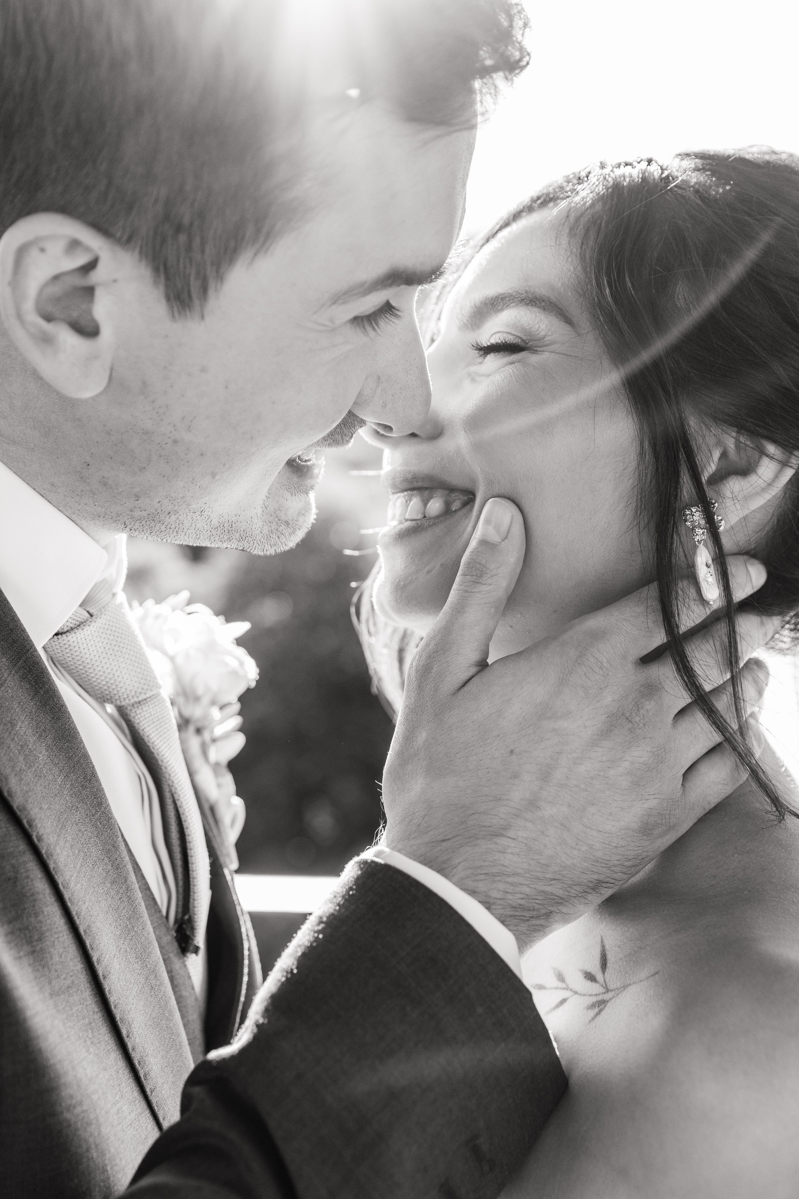 Bride and groom’s first kiss at sunset on a Spanish wedding venue. 