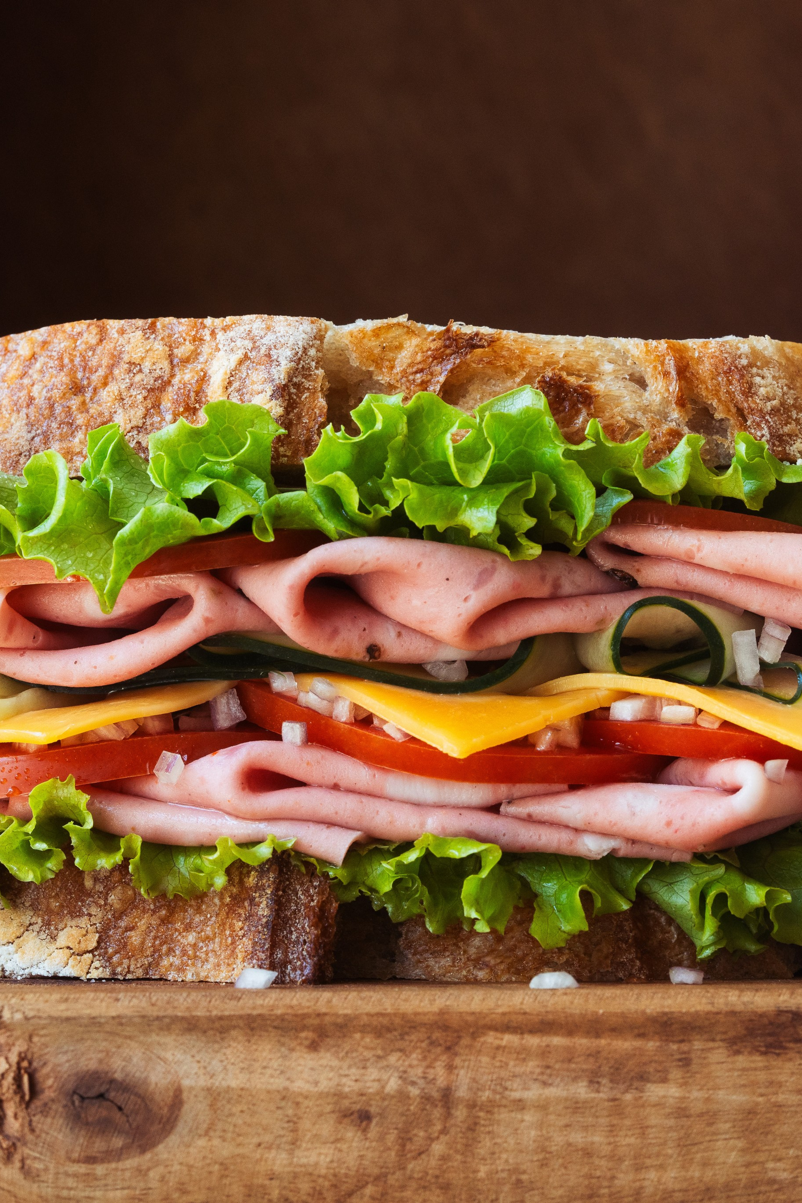 Sandwich with ham, veggies, and sour dough