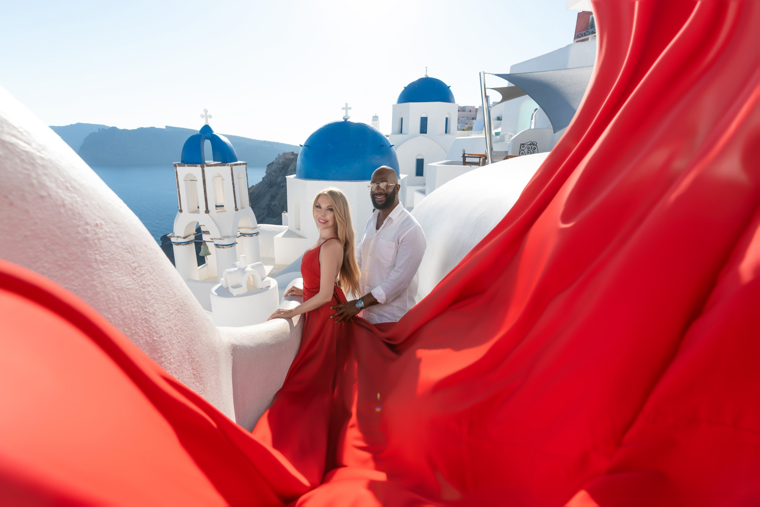 Ethereal Romance: A&nbsp;Breathtaking Flying Dress Photoshoot in&nbsp;Santorini