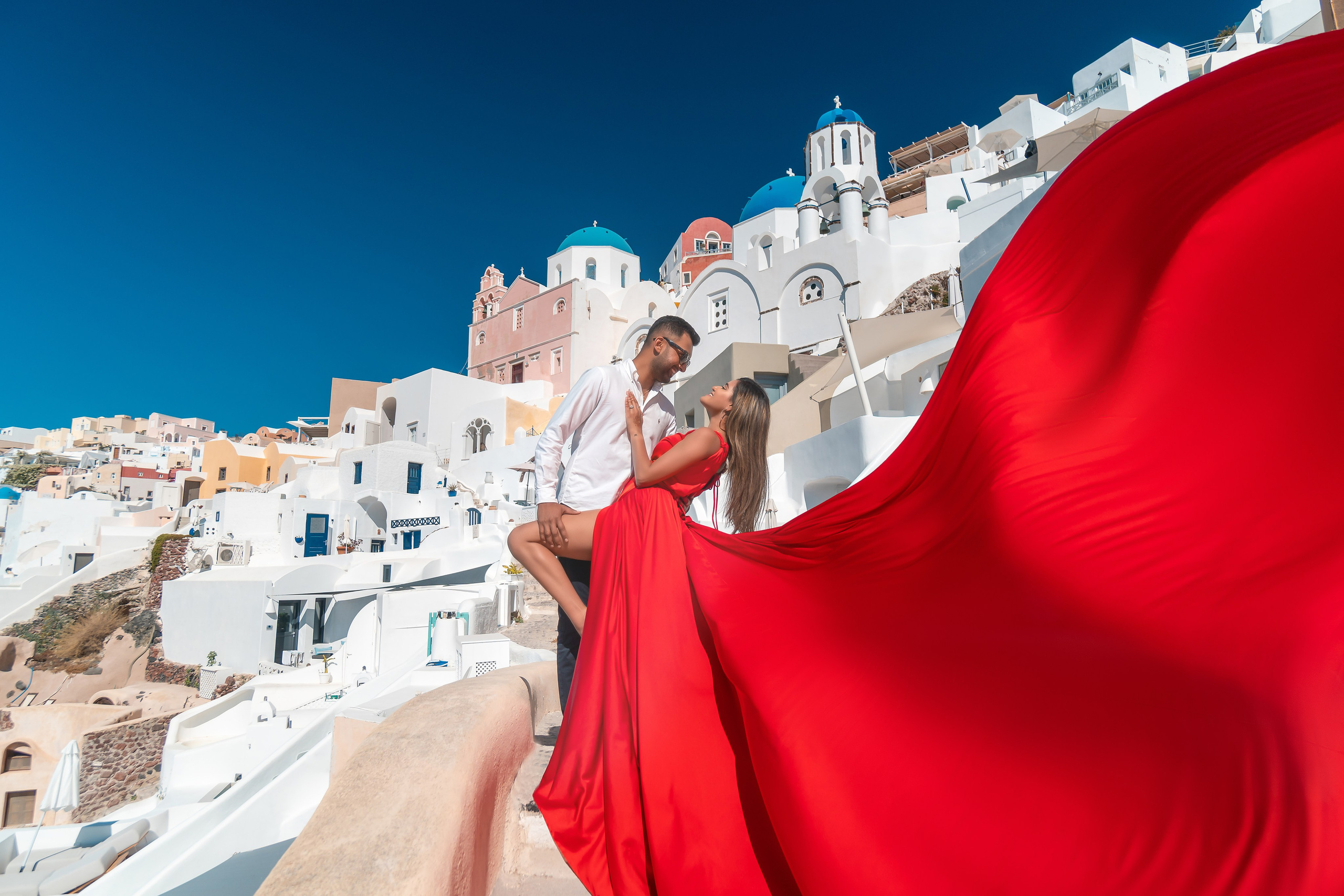 Santorini’s Magic in Motion: Flying Dress Photoshoot with a Lovely Couple from India
