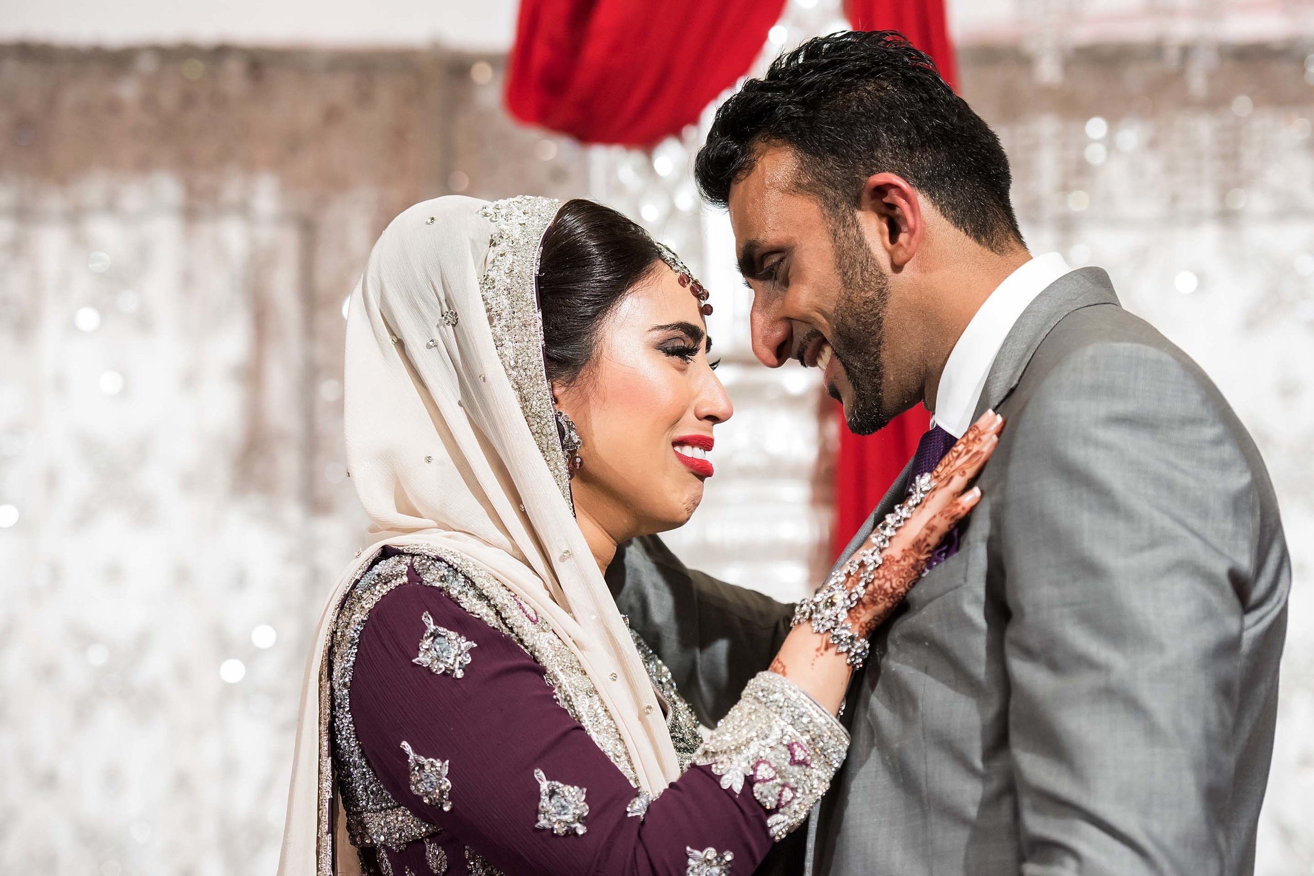 Wedding photographer Premier Banqueting Harrow London UK Nikon D850  bride getting emotional with her brother