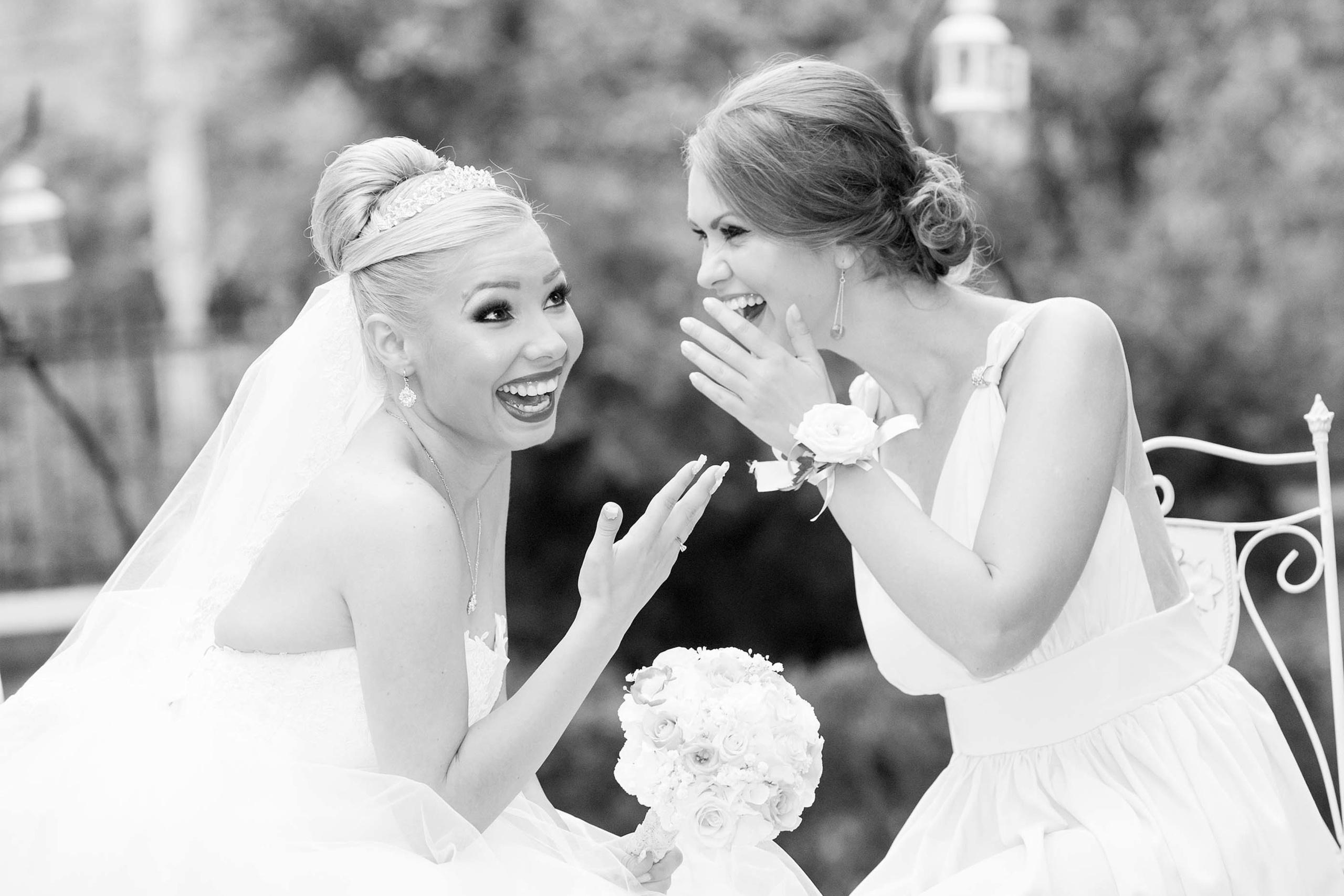 Wedding photographer Ghica Palace Bucharest Romania  Bride and bridesmaid giggling Nikon D850