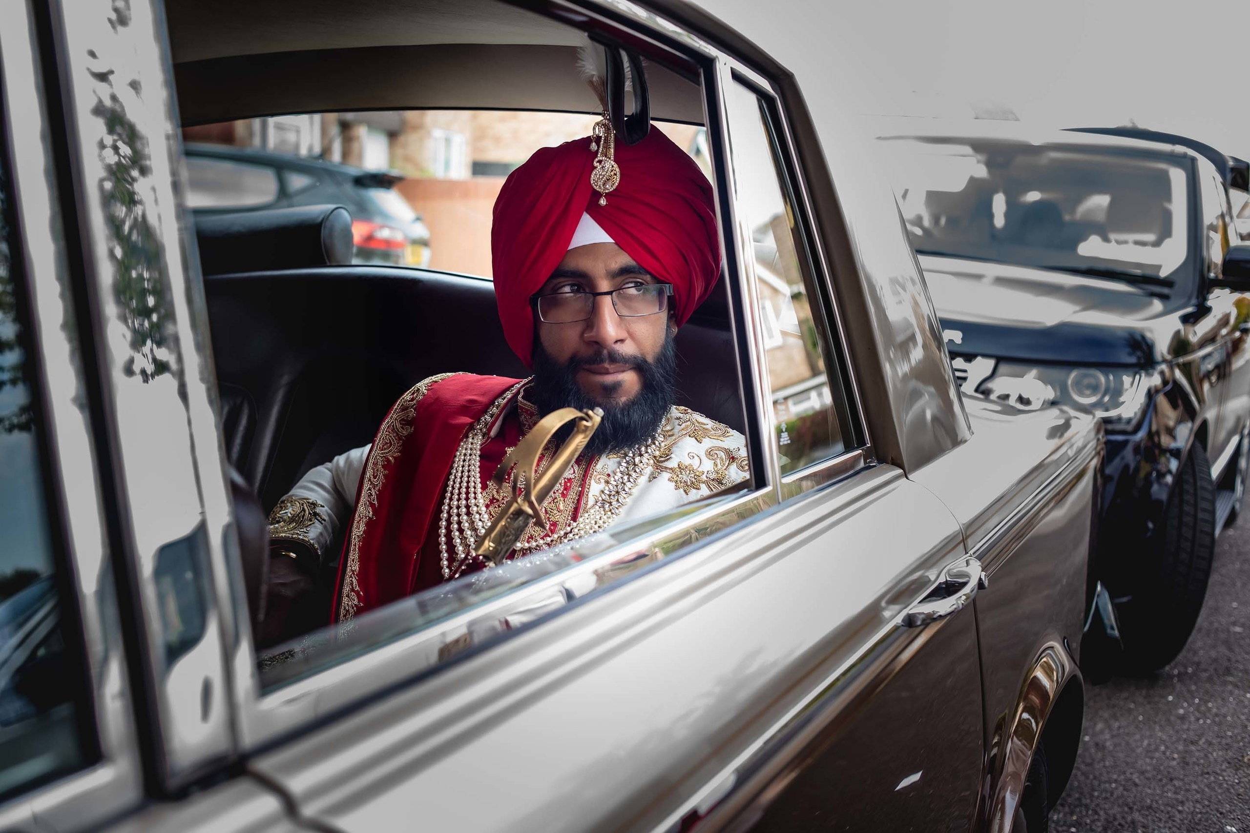 Wedding photographer Kelham Hall Newark UK groom in Rolls Royce Nikon D850