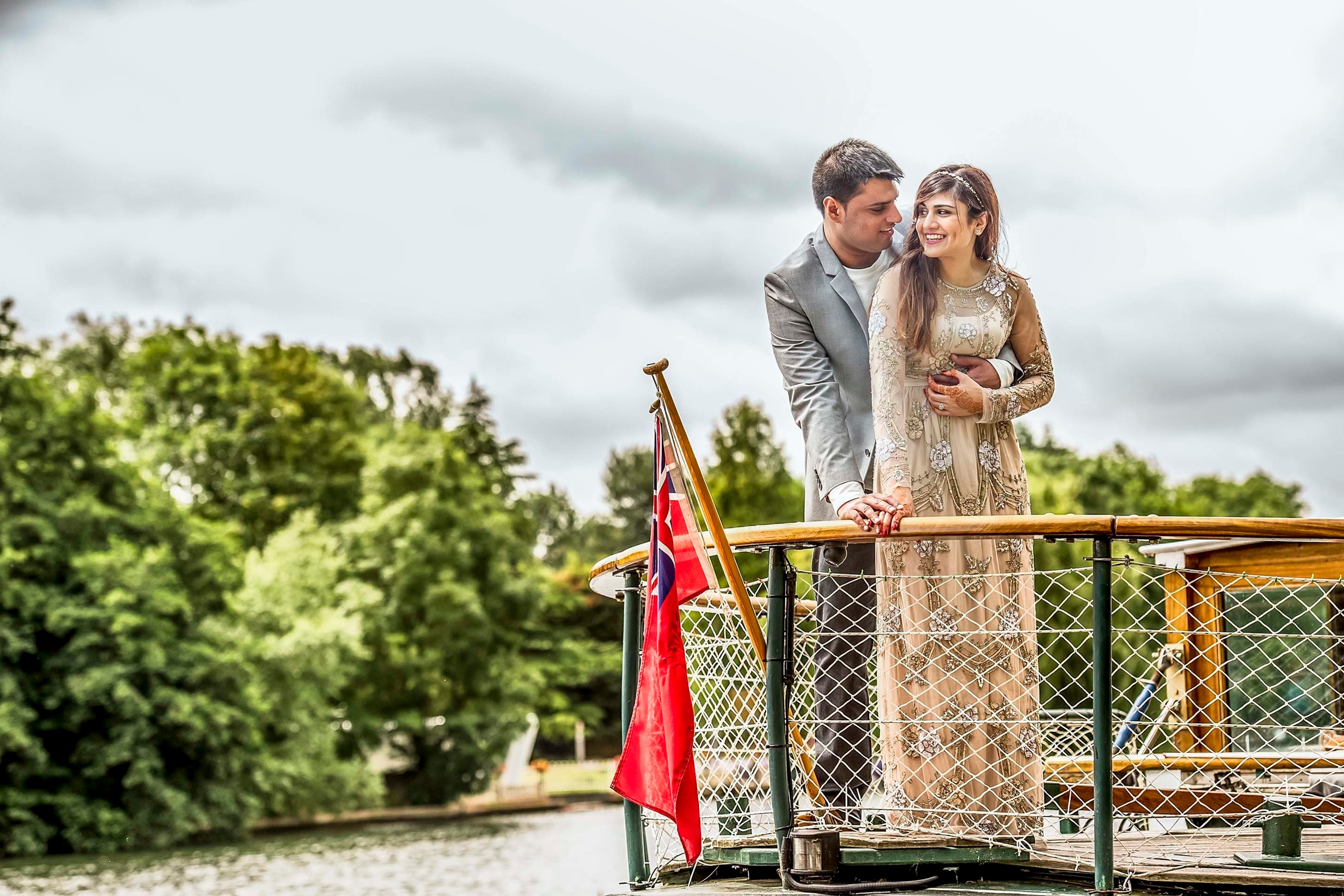 Wedding photo session with couple laughing while enjoying a boat ride in Marlow, UK. Nikon D810  & Nikon 70-200 mm lens