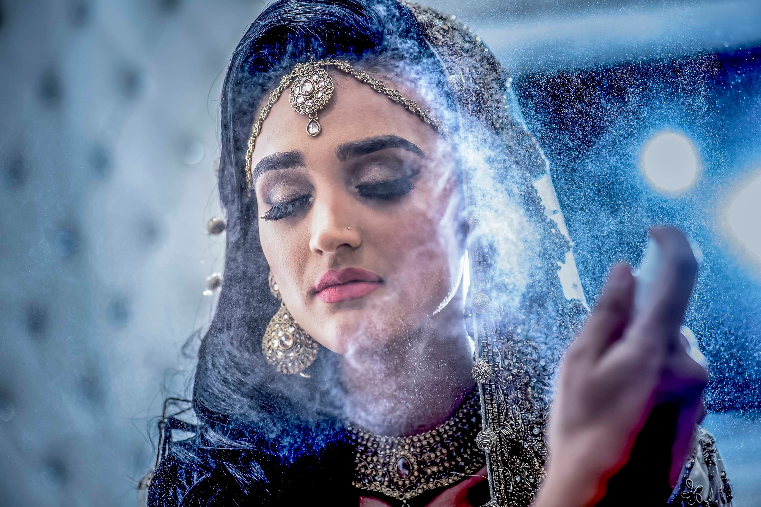 Wedding photographer Jockey Club, Sandown Park bride fixing her hair Nikon D850