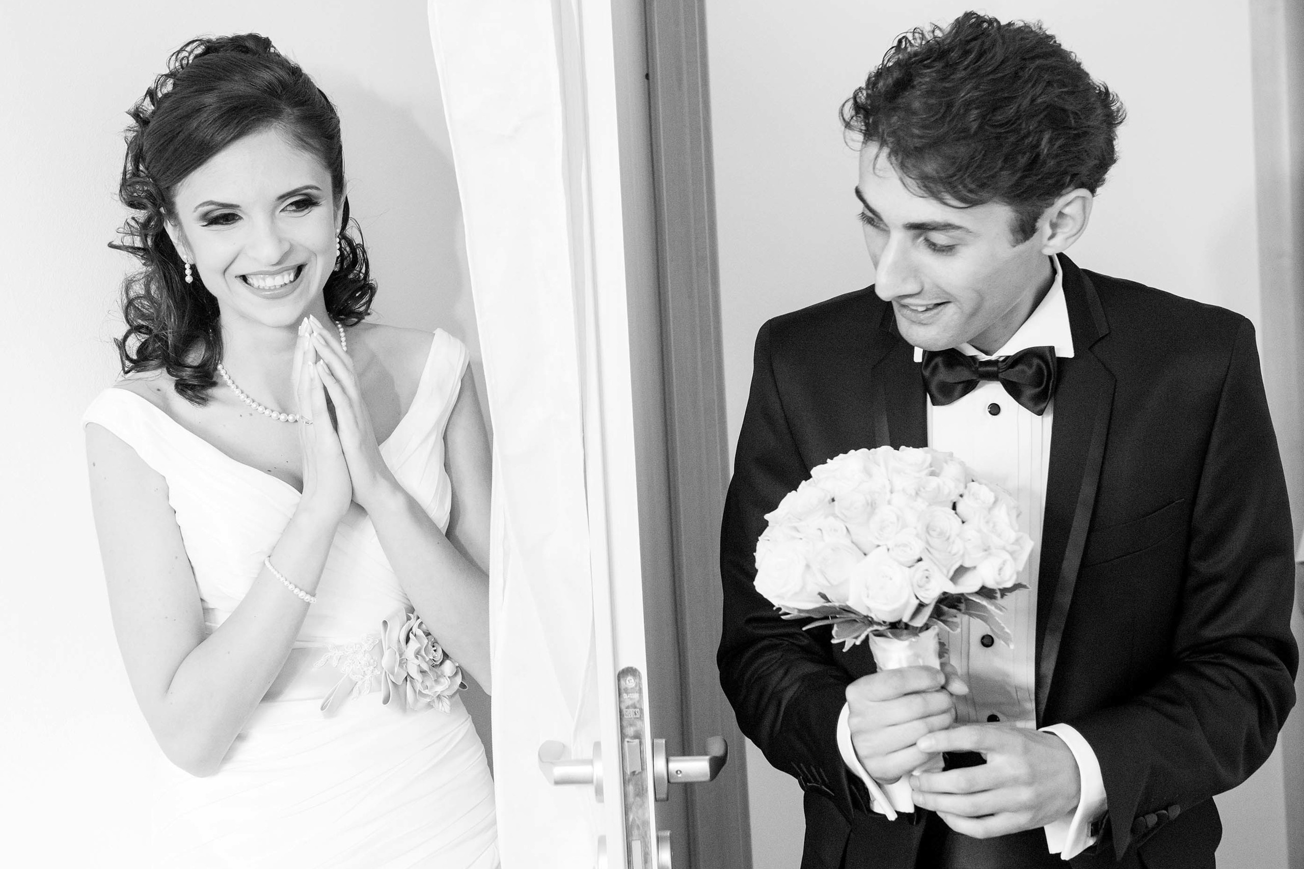 Wedding photographer Bucharest Romania groom bringing flowers to bride  Nikon D850