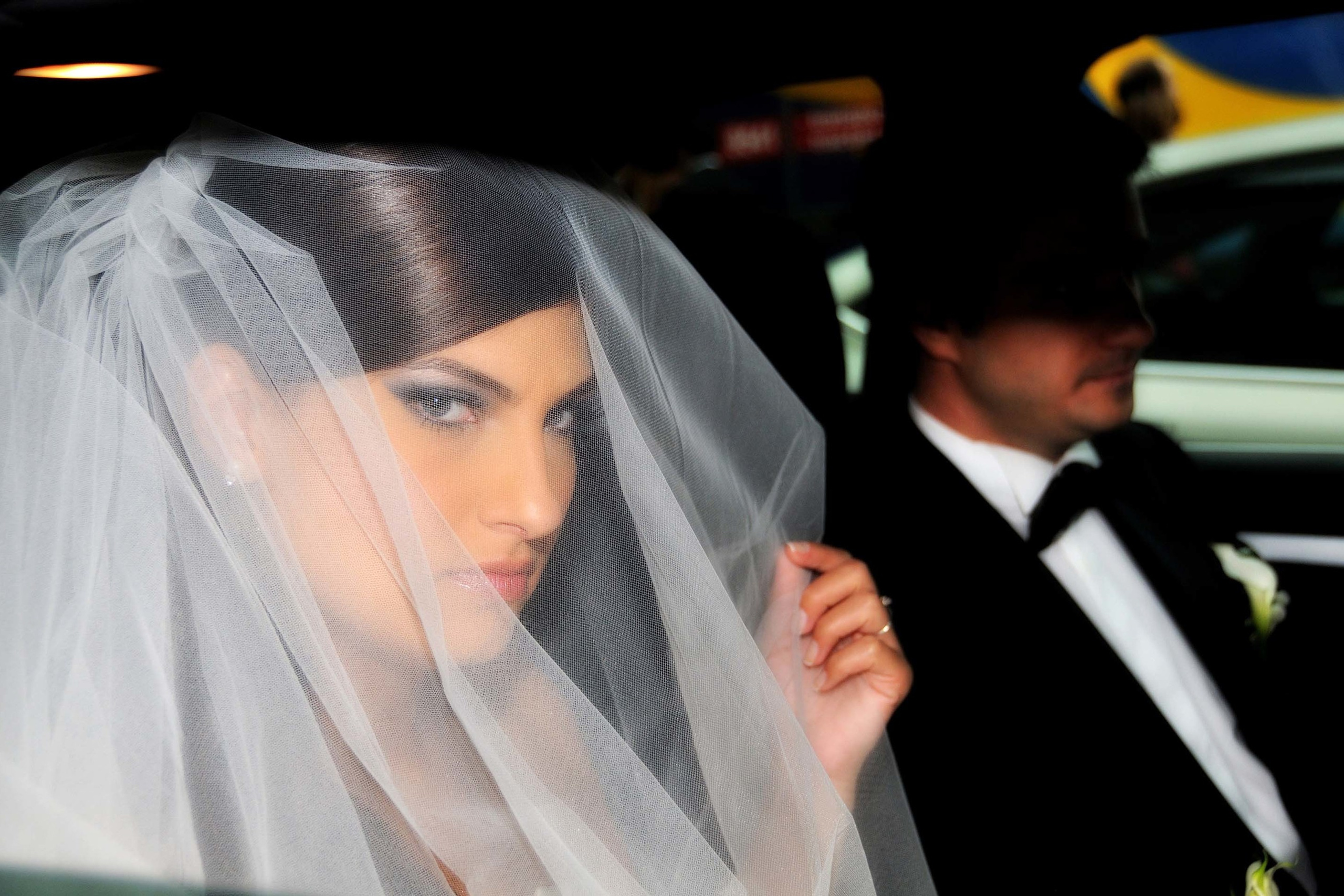 Wedding photographer Snagov Palace, Bucharest Romania Bride and groom  driving a Mercedes S Klass Nikon D850