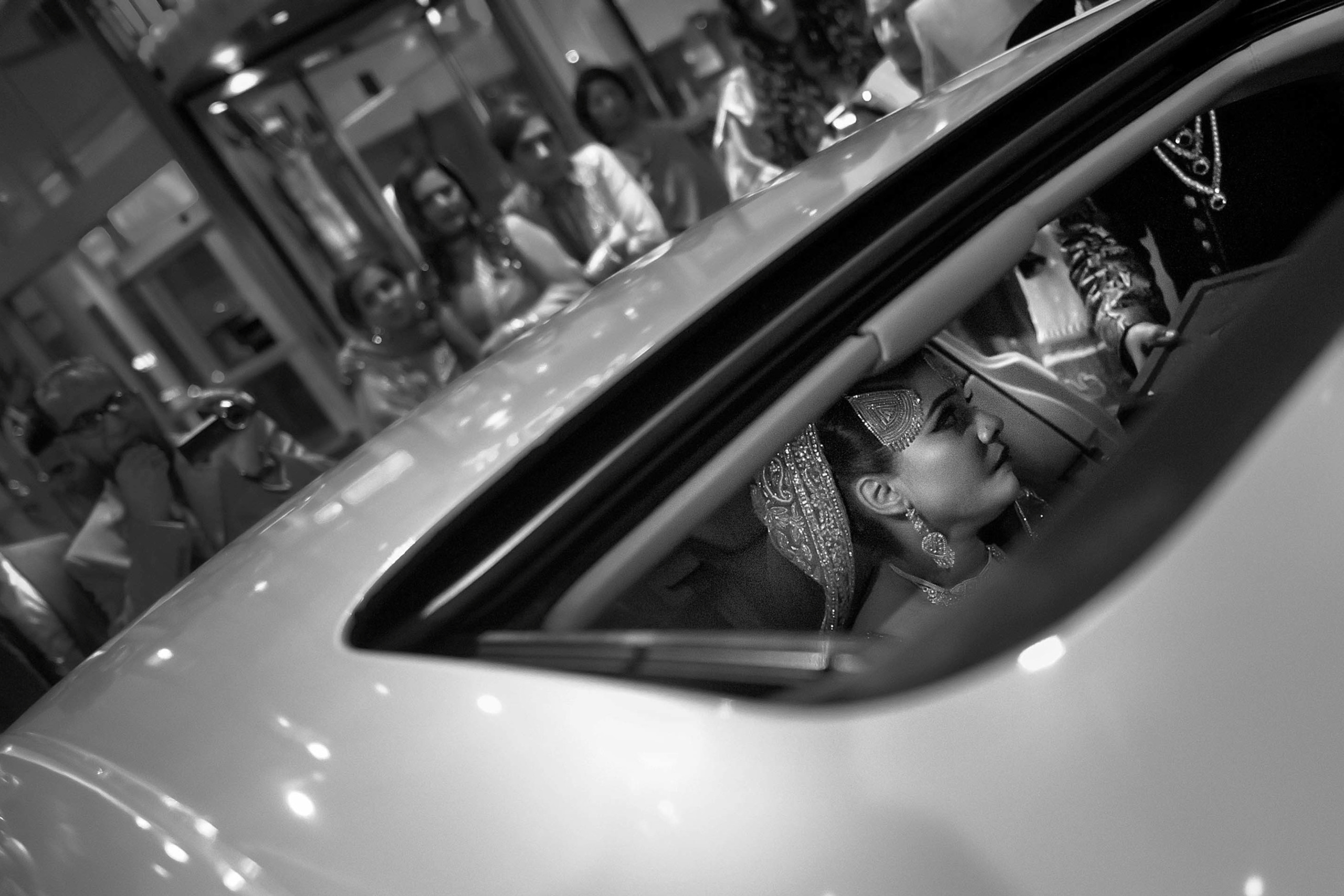 Wedding photographer Hilton London Heathrow Airport Asian bride in Rolls Royce Nikon D850