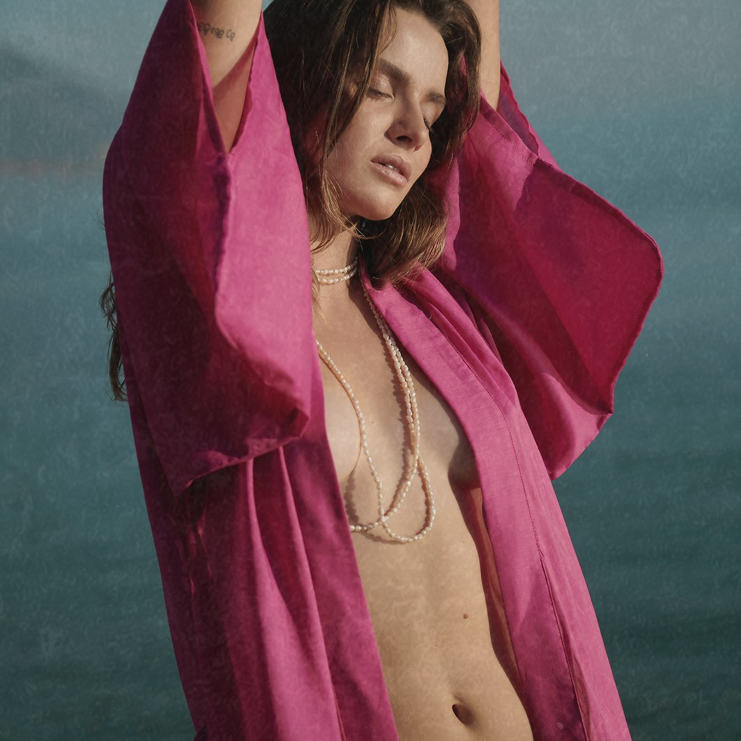 Outdoor portrait session with a female model, showcasing beachwear 