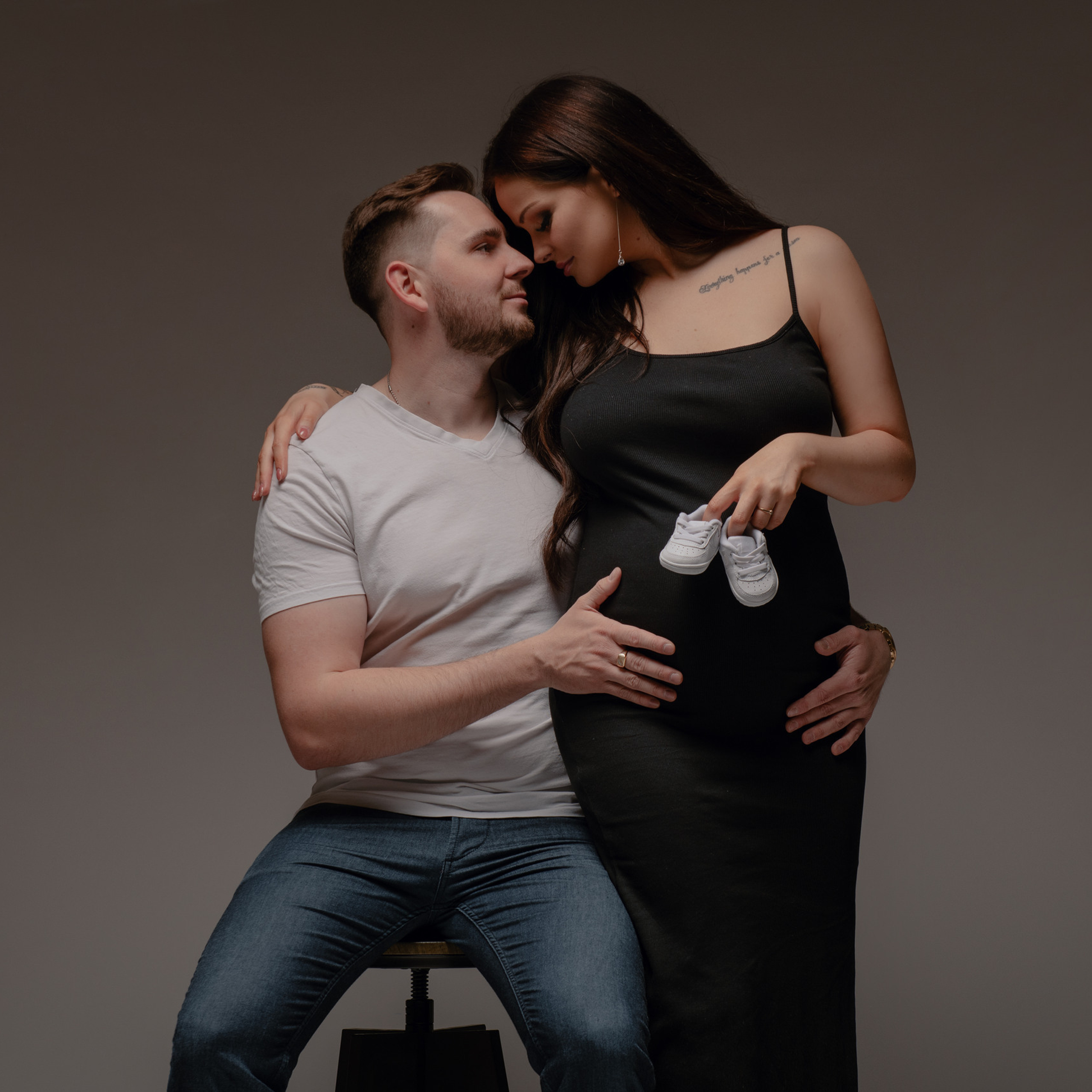 Maternity love story photoshoot in the studio in Prague. Professional photographer in Prague Anastasia Haritonova