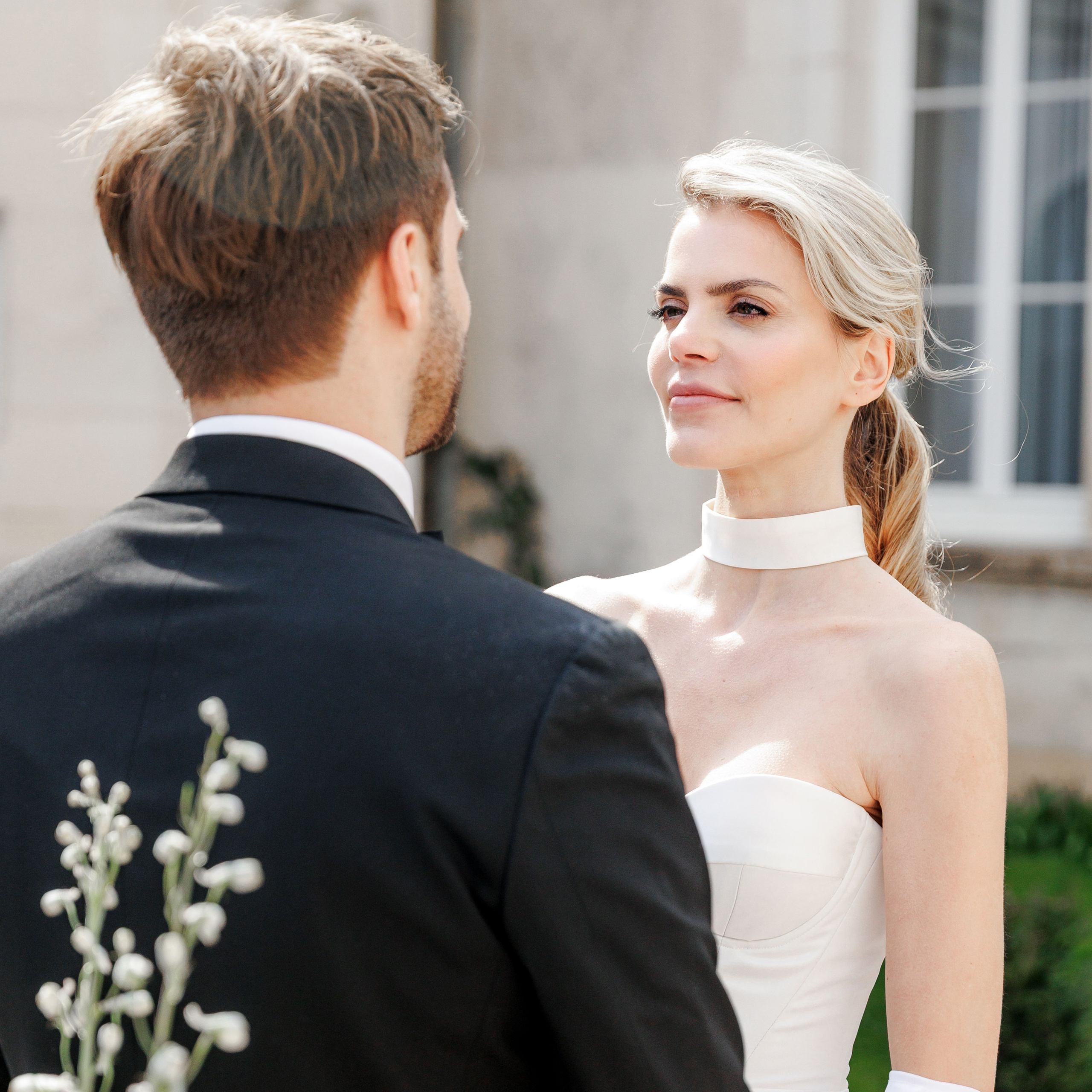 Glamorous bridal beauty shot highlighting makeup and hairstyle for a destination wedding in Barcelona