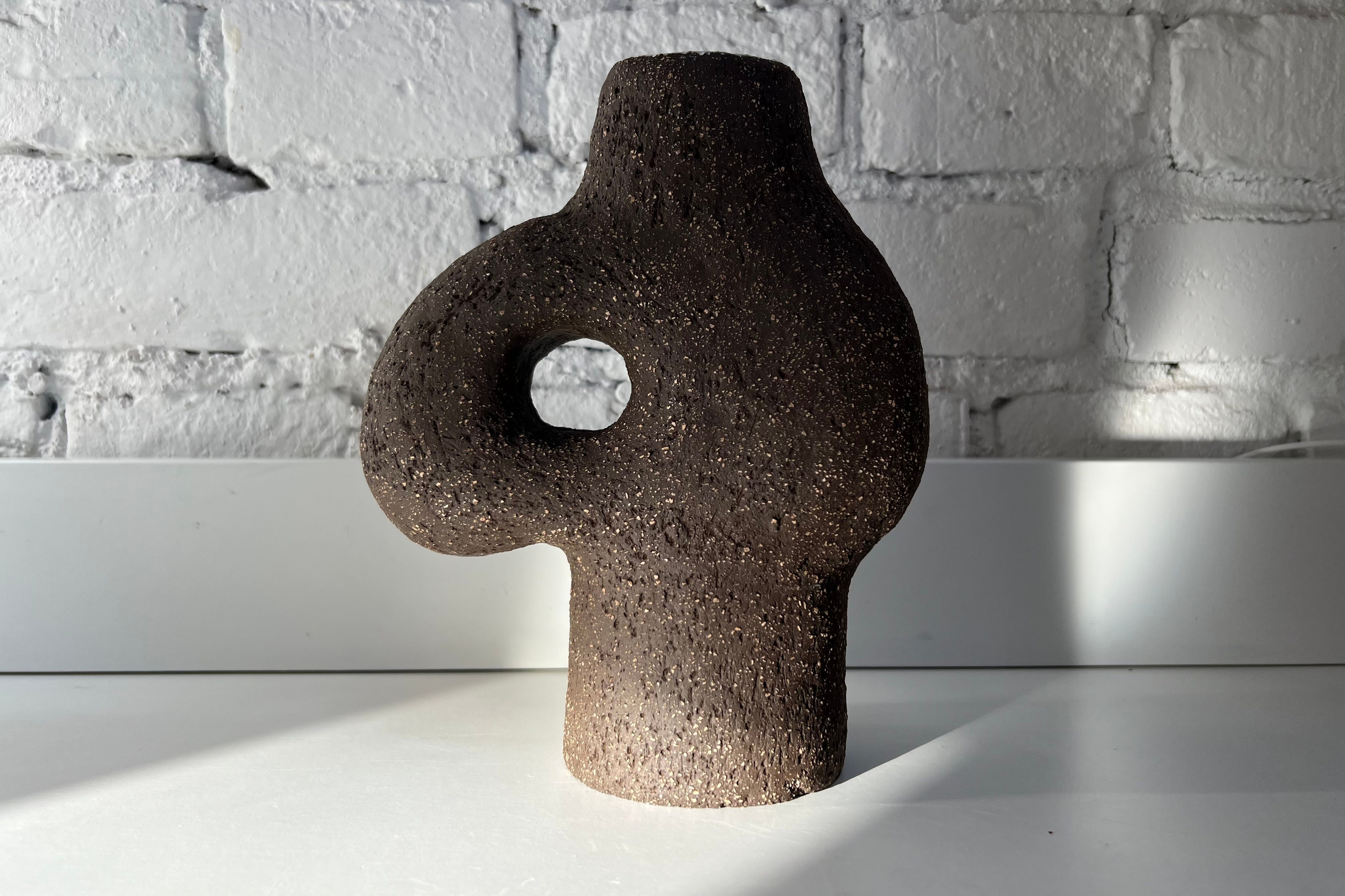 small handmade ceramic vase