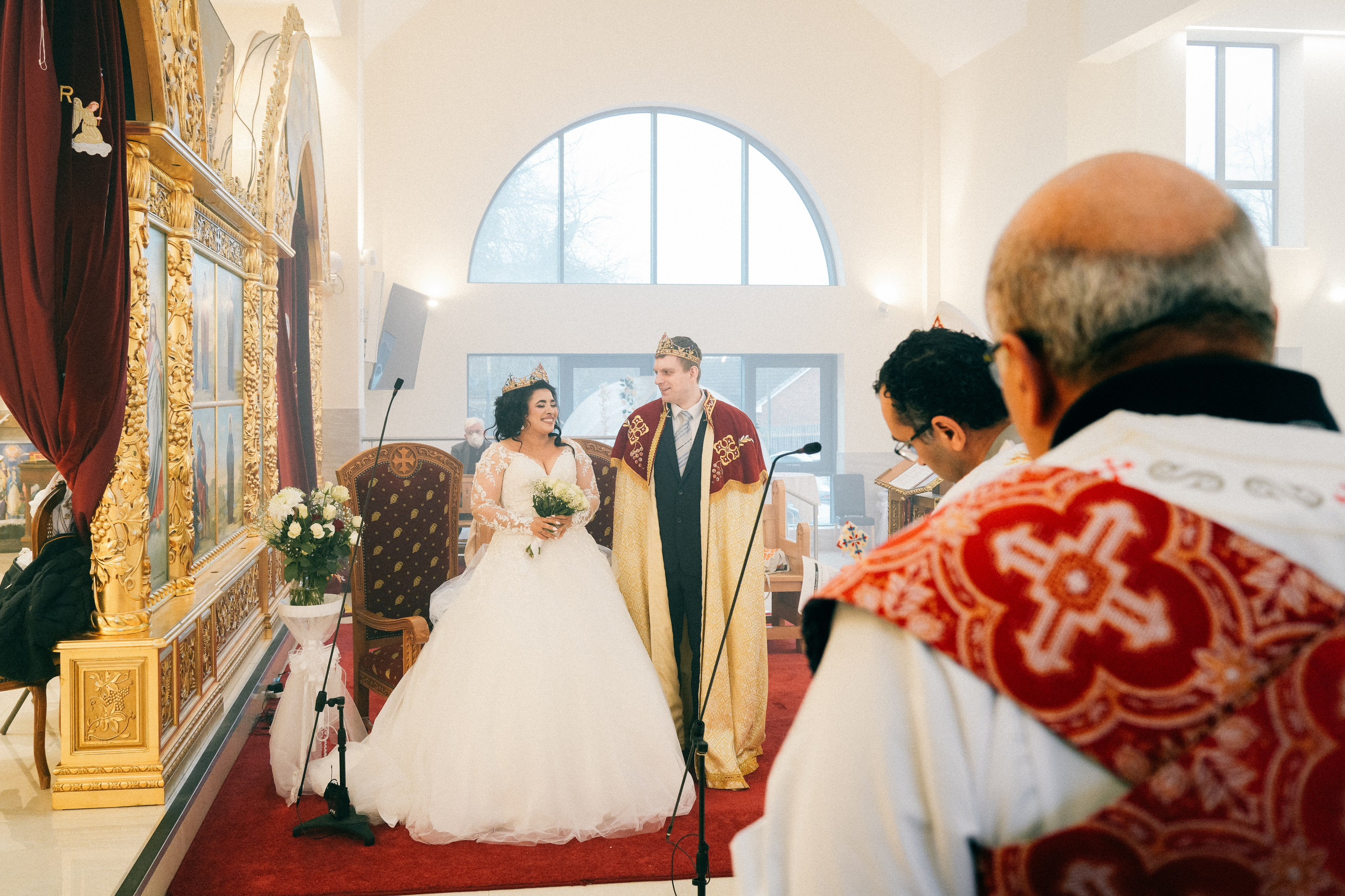 A sacred moment inside the Orthodox cathedral in Solihull, as the couple begins their journey with quiet grace and devotion.