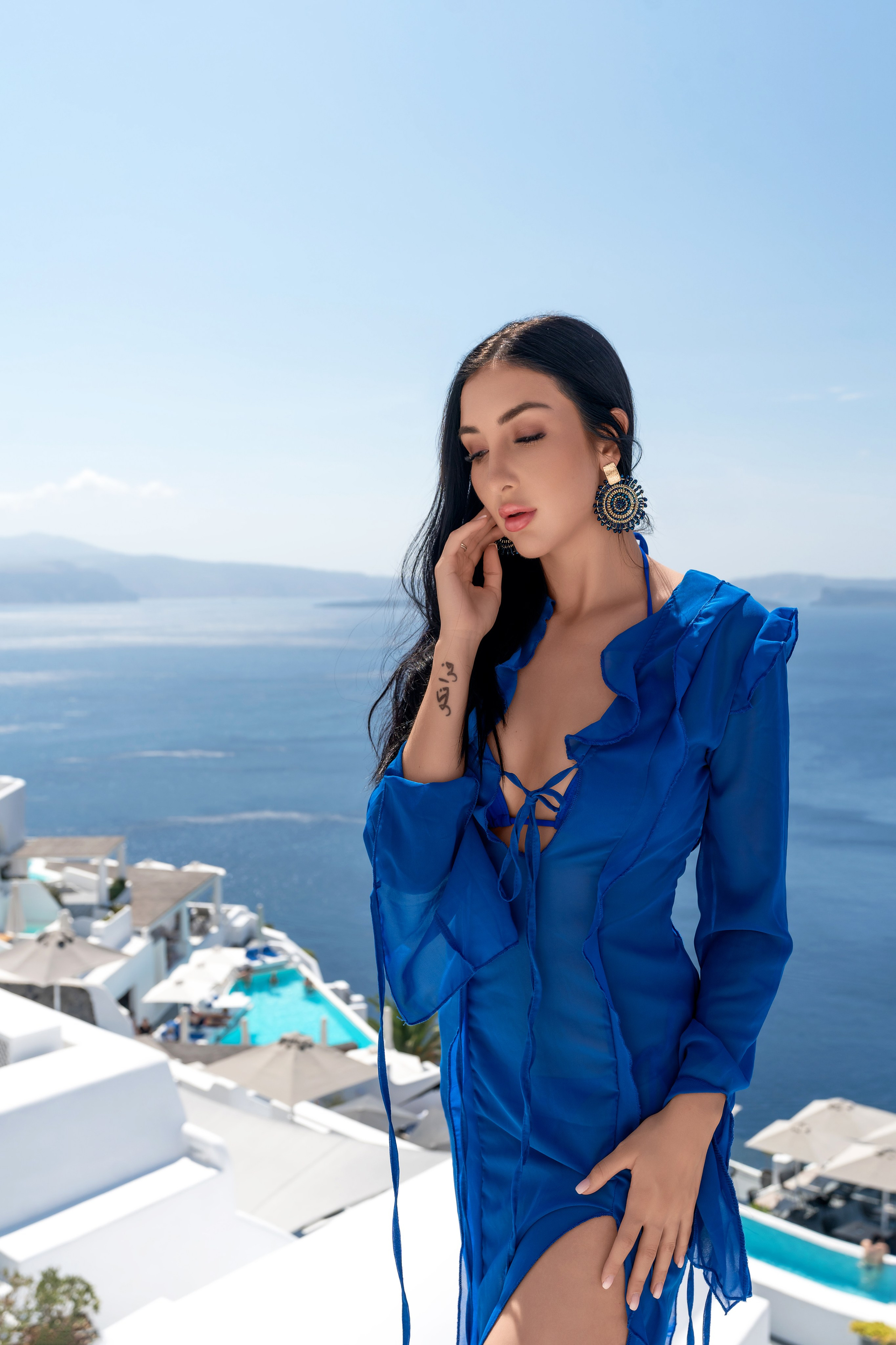 Why a Pool Photoshoot in Santorini is a Fantastic Idea. Photographer in Santorini SokoLOVE Alex| Flying Dress Santorini