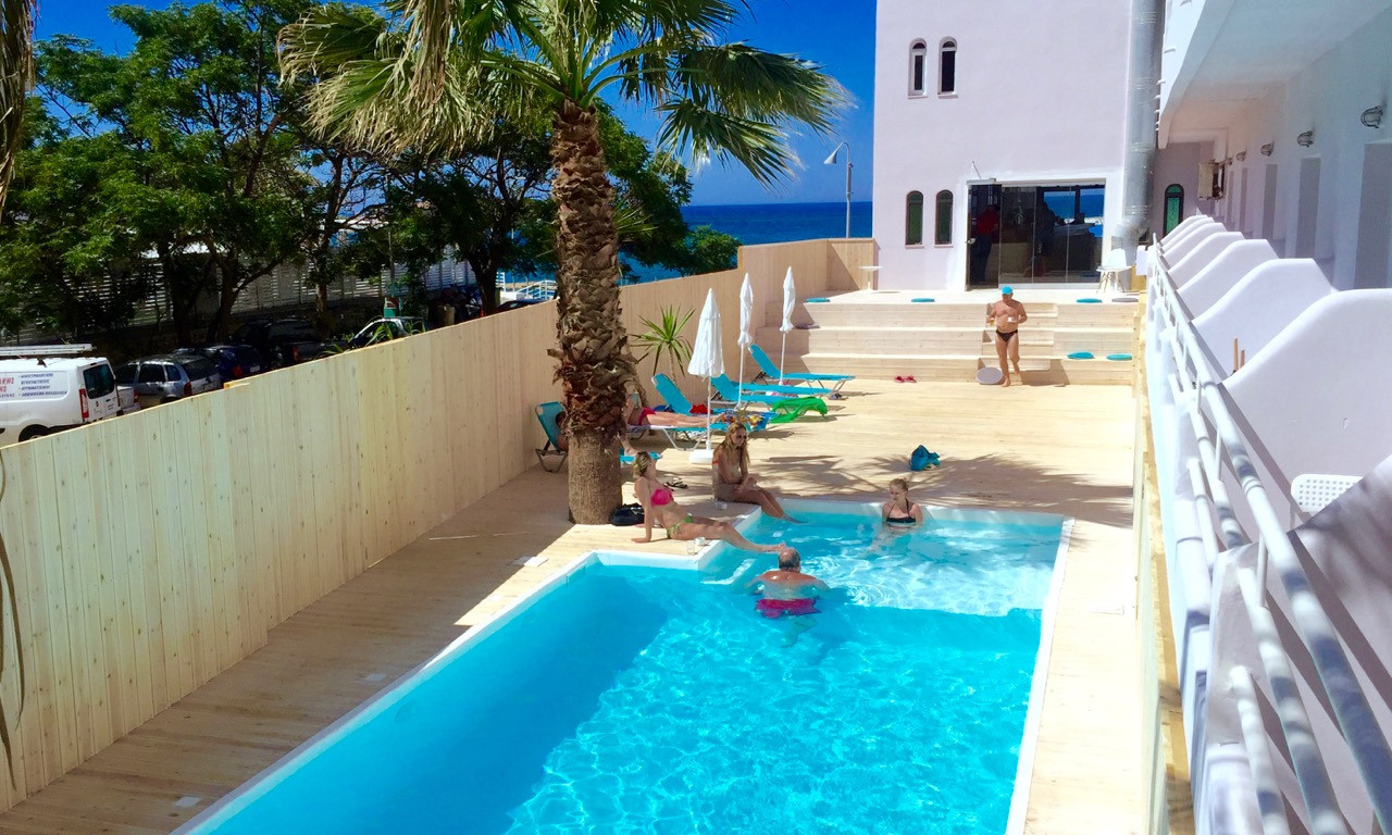 Hotel photographer Crete. Photographer in Santorini SokoLOVE Alex| Flying Dress Santorini