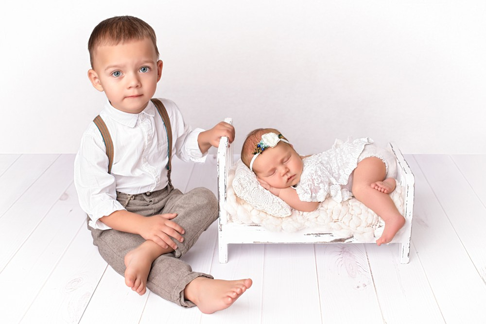 Sesja noworodkowa z rodzicami i rodzeństwem - Natalia Lucko