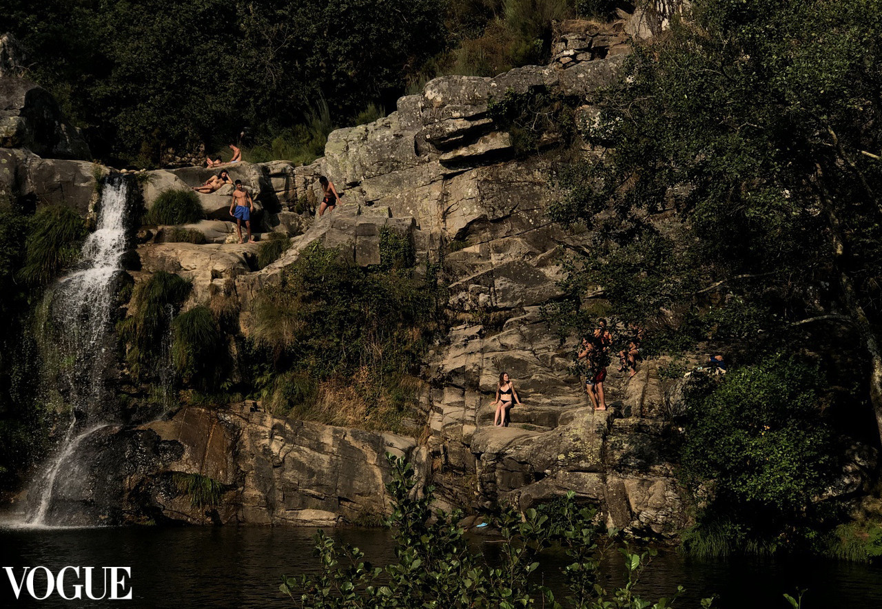 Documentary photography of my travel to Portugal, a waterfall in the forest the locals know it as an escape from the heat