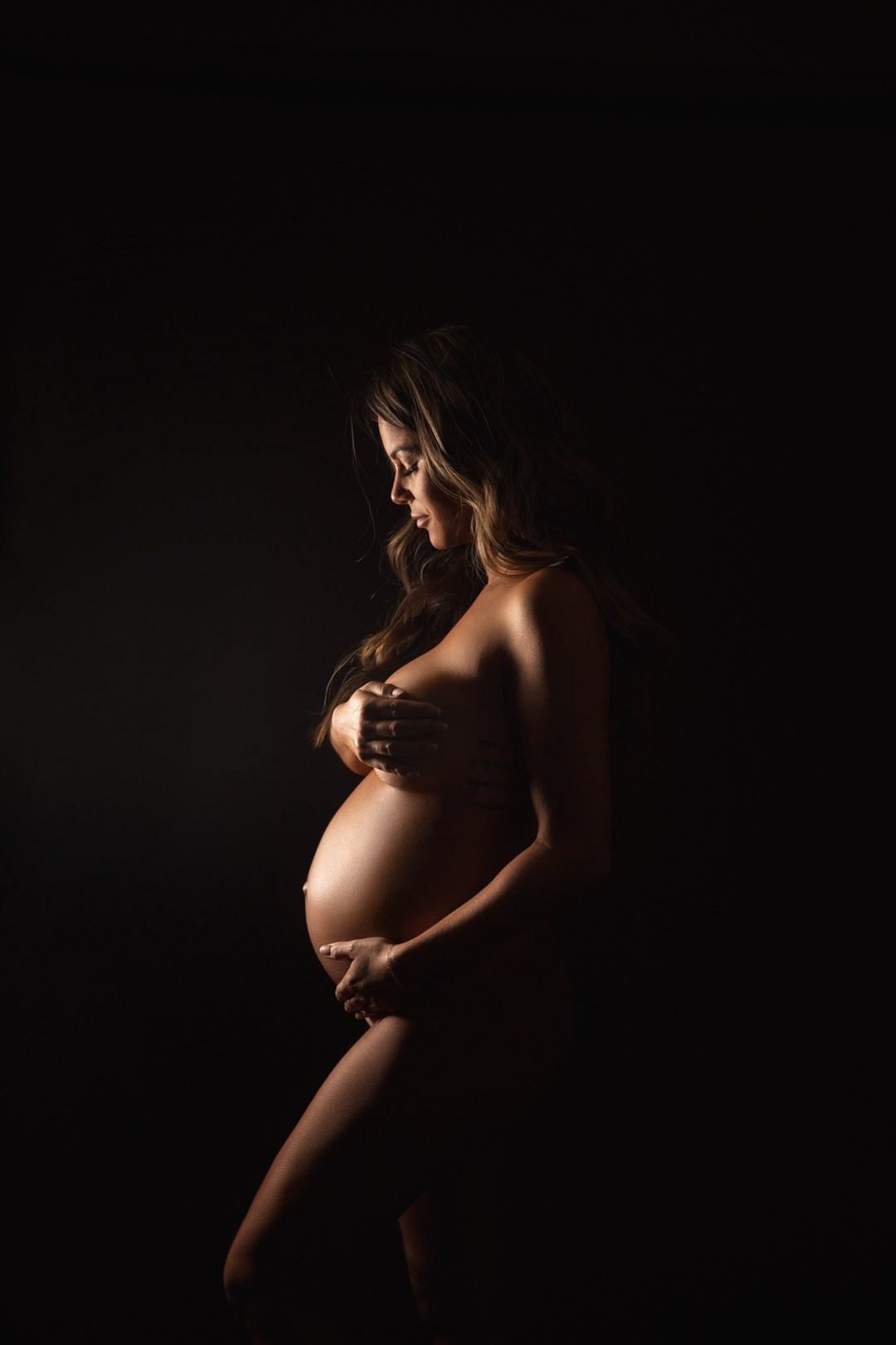 Pregnancy. Triple-A photo studio