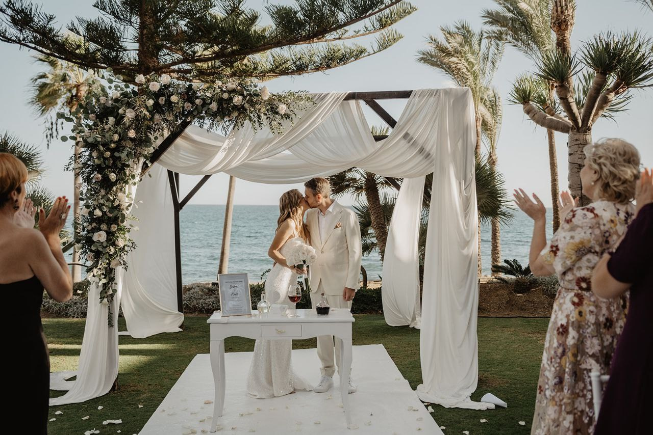 Wedding tables with flowers and candles. Plan Your Dream Wedding or Elopement in Sunny Southern Spain | Amore Mio Weddings