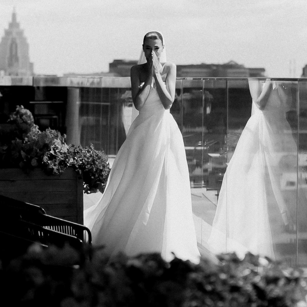 Editorial flat lay of wedding stationery suite