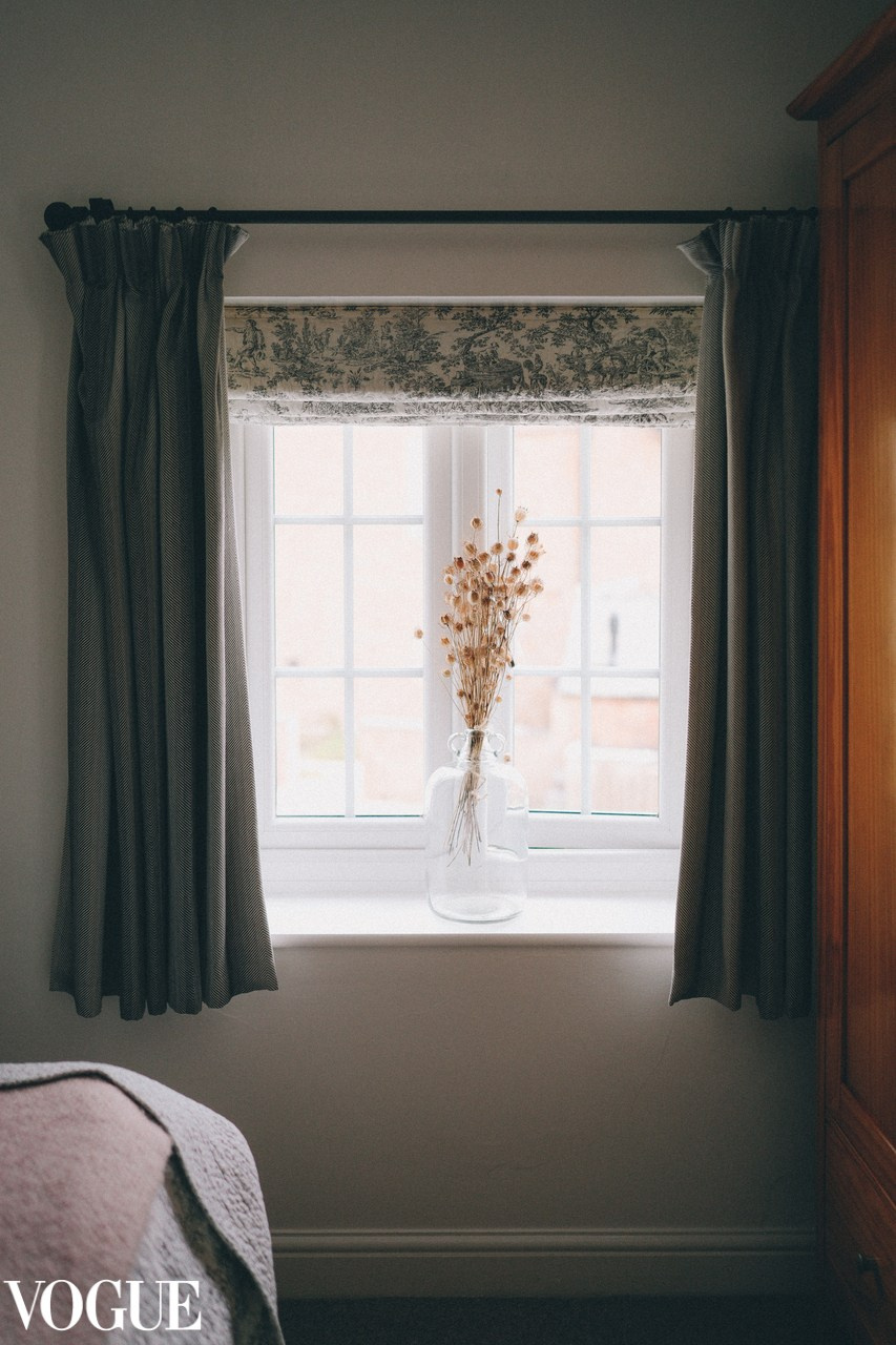 Interior photography by Irina Zoteeva. Vase in the window in the bedroom.  