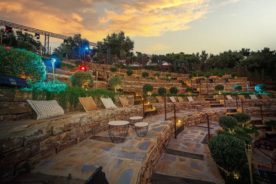 wedding venue featuring stone amphitheater-style chairs