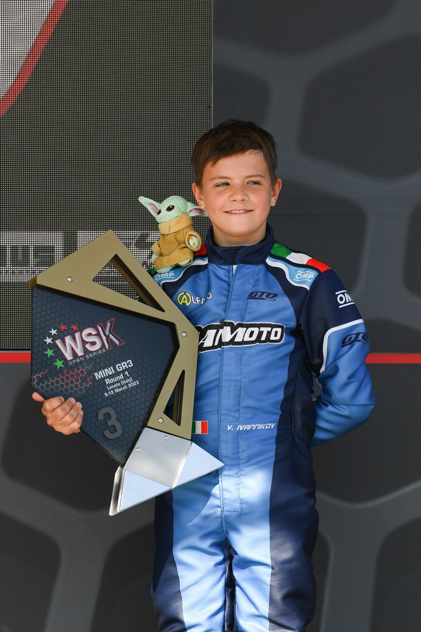 Cute podium with Baby Yoda Vladimir Ivannikov best drive in Lonato