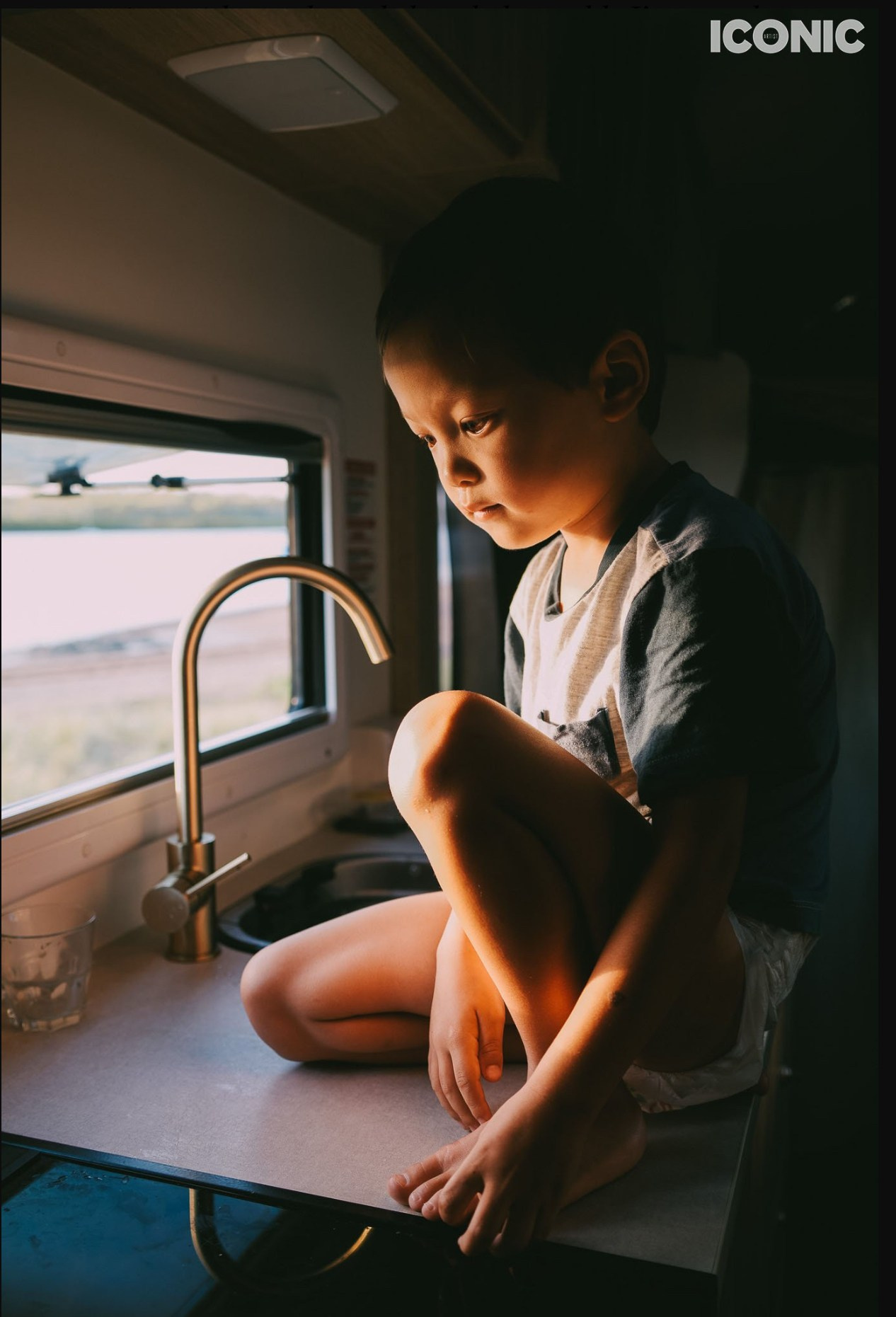 Boy in motorhome. Irina Zoteeva Photography in Iconic magazine.