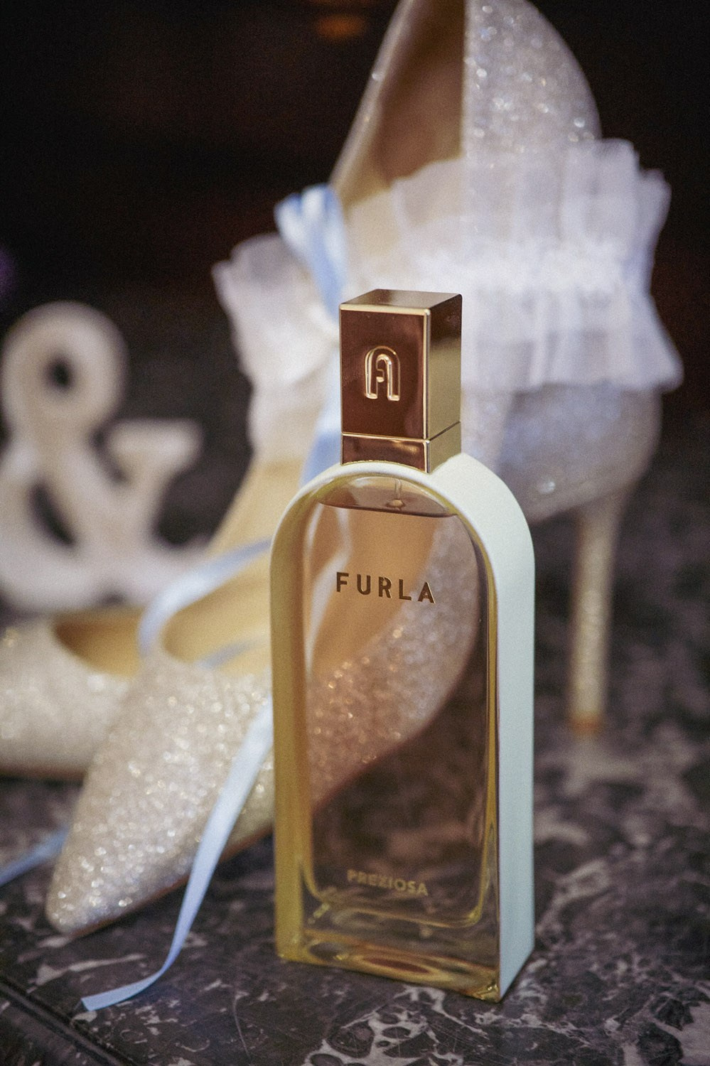 A bottle of the Brides favorite fragrance is seen in the bridal suite at the Hotel Constance in Prague. 