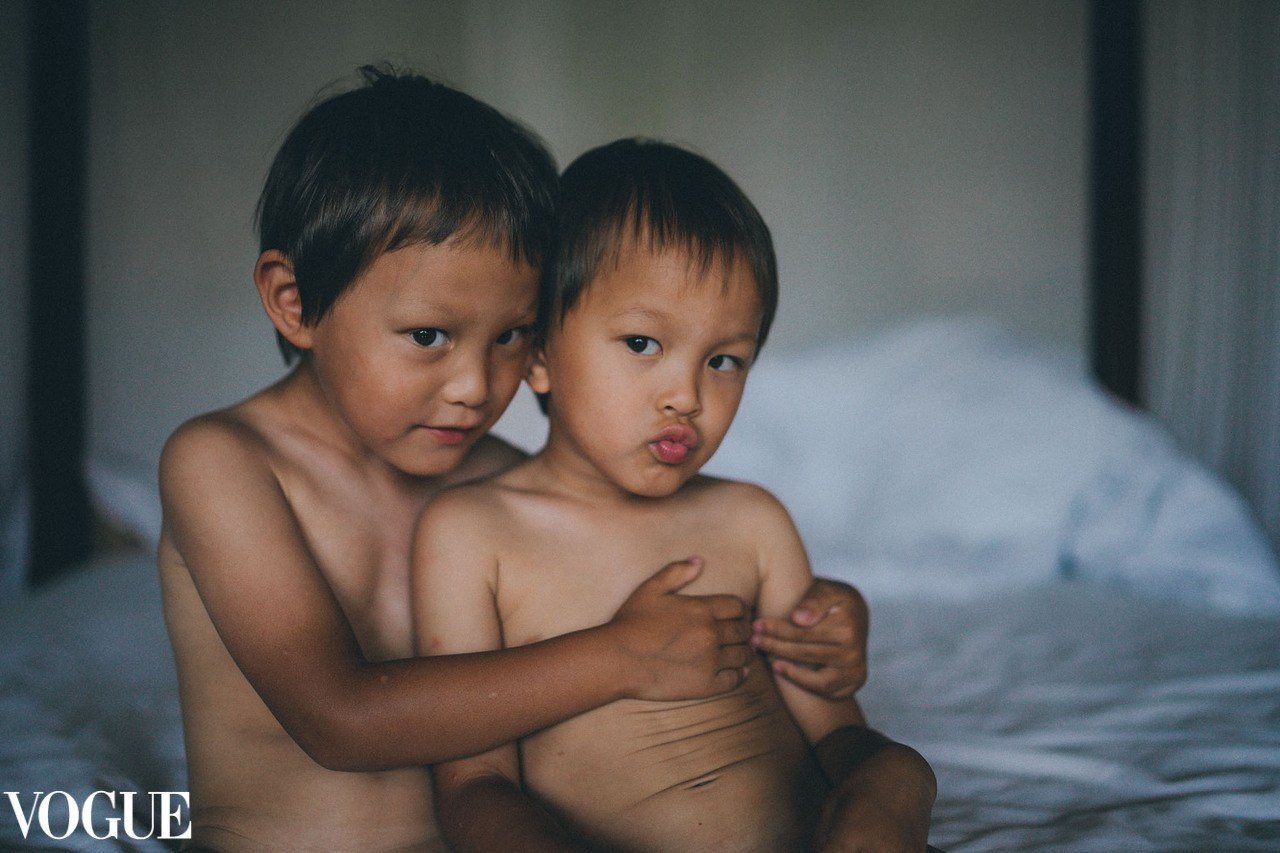 two boys are hugging, vogue photography. Solihull family photographer.