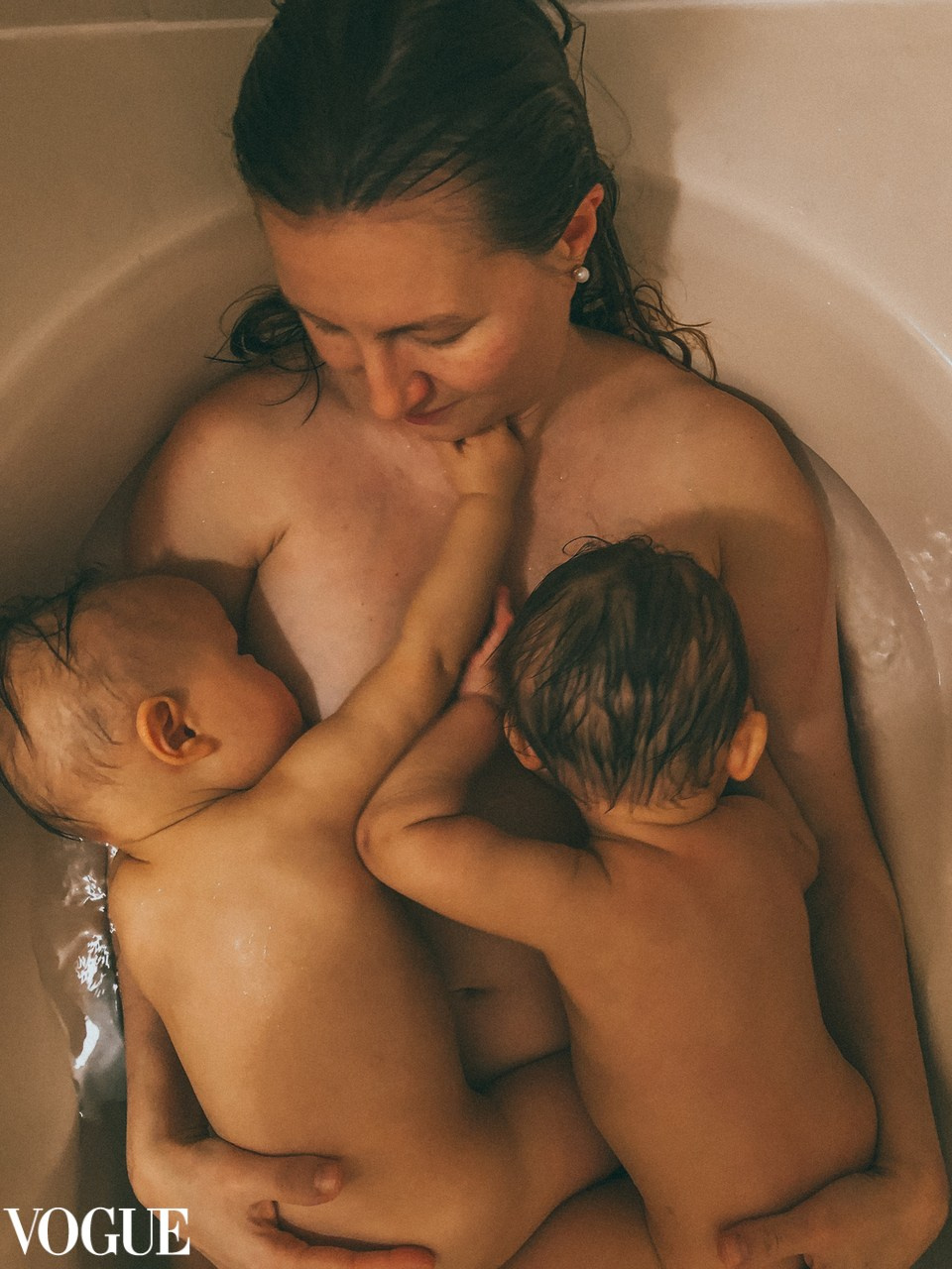 Twins boy nursing at the bath time. VOGUE Irina Zoteeva, newborn photographer Solihull, motherhood photographer, kids photography. Newborn and maternity photographer Solihull and Birmingham. Twins photographer Solihull and Birmingham. 