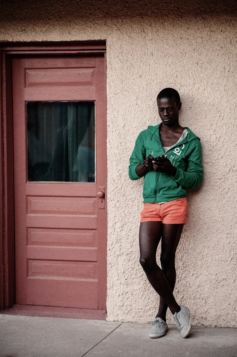 African-American student against a wall at a Texas art school.