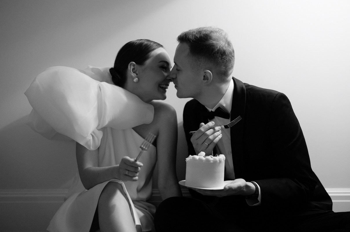 Fashionable couple outside boutique hotel in Paris