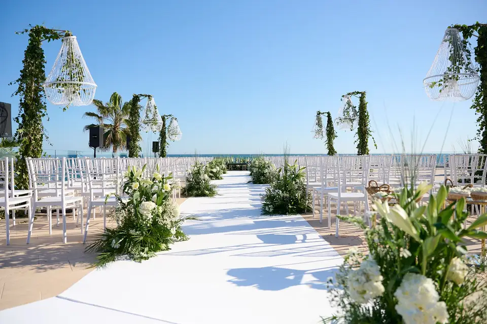 beach restaurant ceremony with flowers and candles