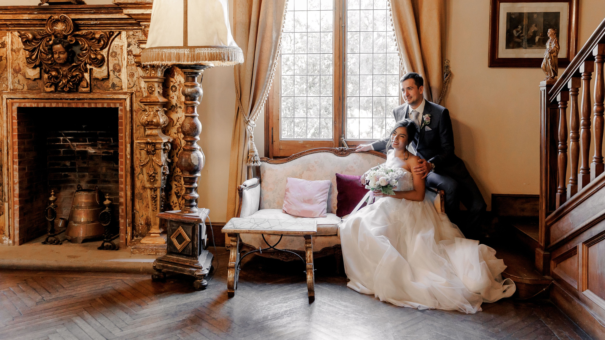 Newlyweds enjoying the interior of the iconic destination wedding venue in Spain