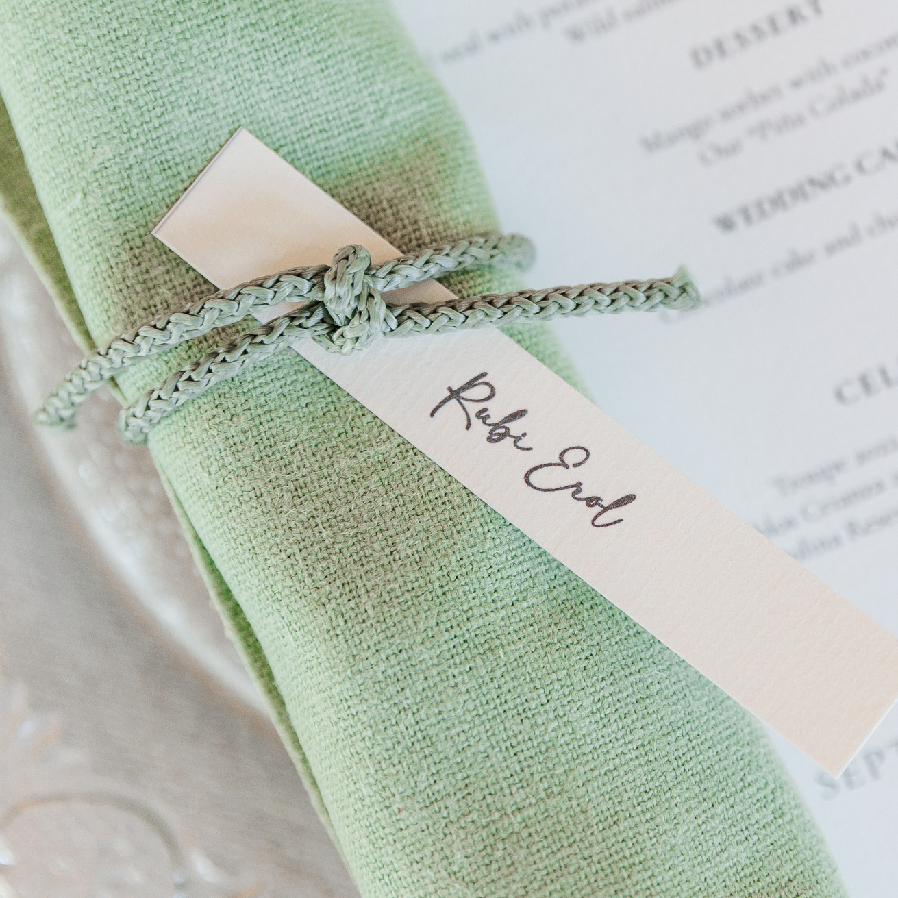 Detail shot of wedding dinner setup at La Baronia’s dining hall