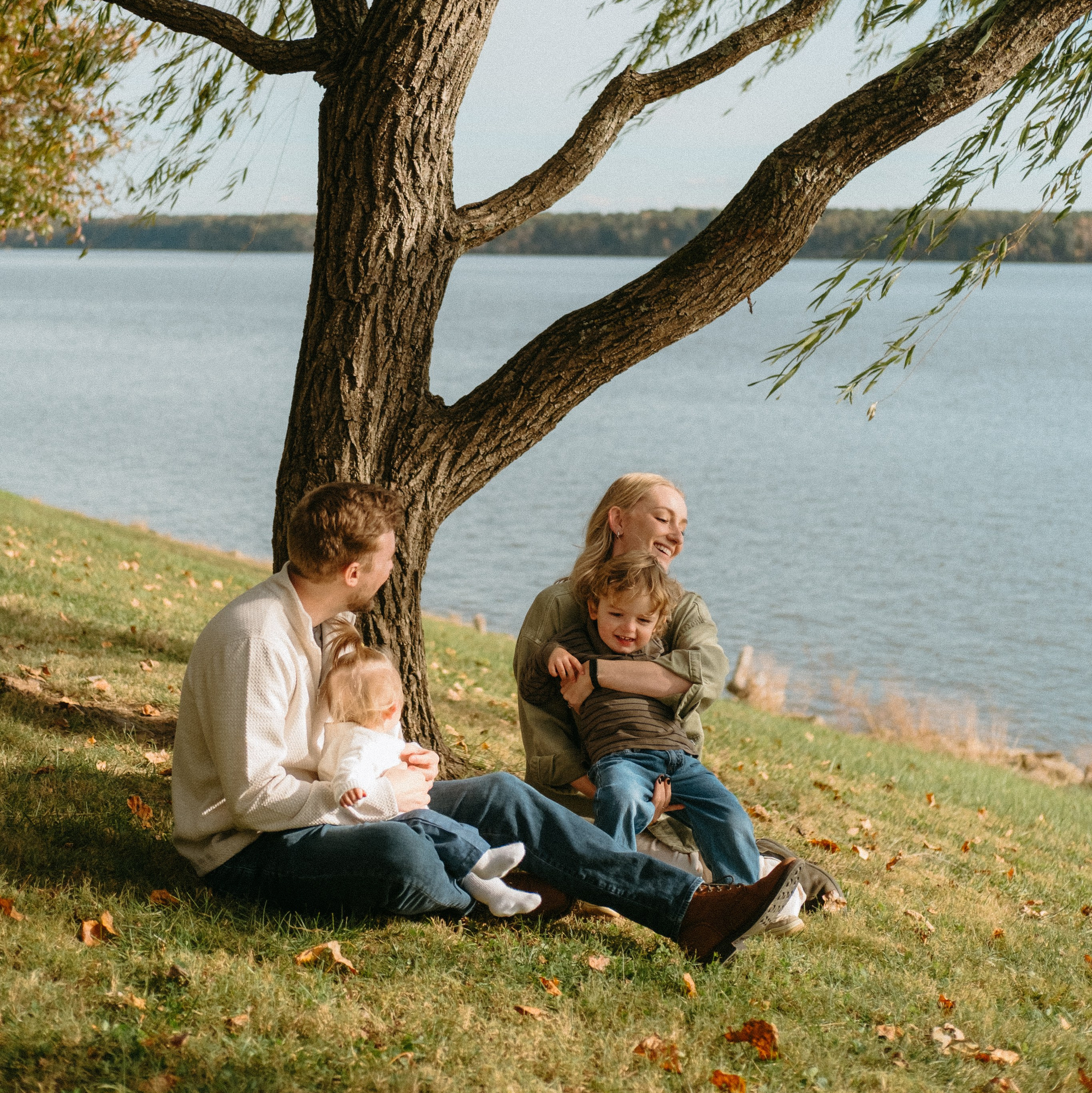 A mother and her 2 babies during a family session at Maymont park in Richmond, VA