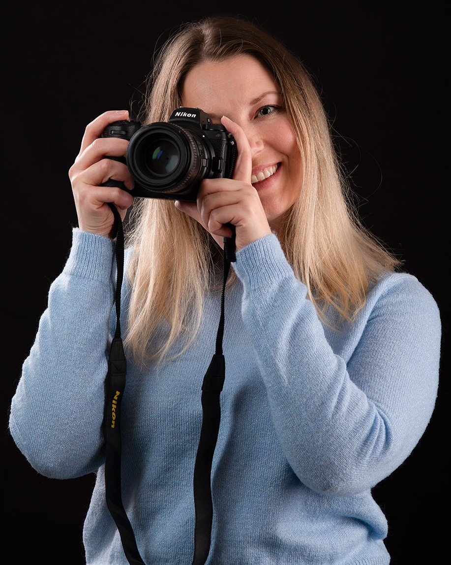 Portrait of newborn photographer Irene Chaikeen in her studio
