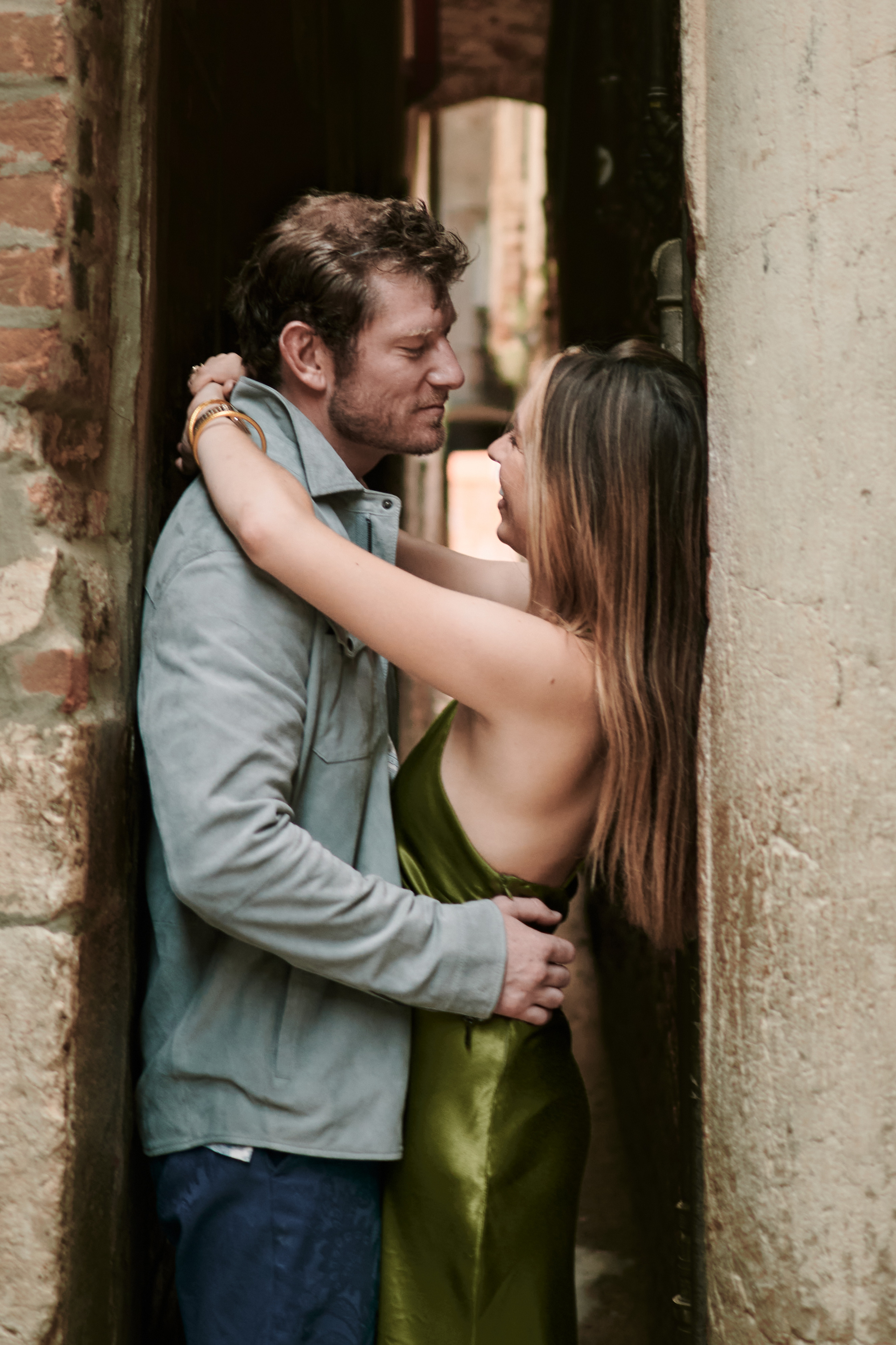 In the heart of Venice, amidst its labyrinthine alleys and narrow canals, a timeless love story unfolds. A couple, intertwined by fate, finds themselves lost in the enchanting embrace of this captivating city.