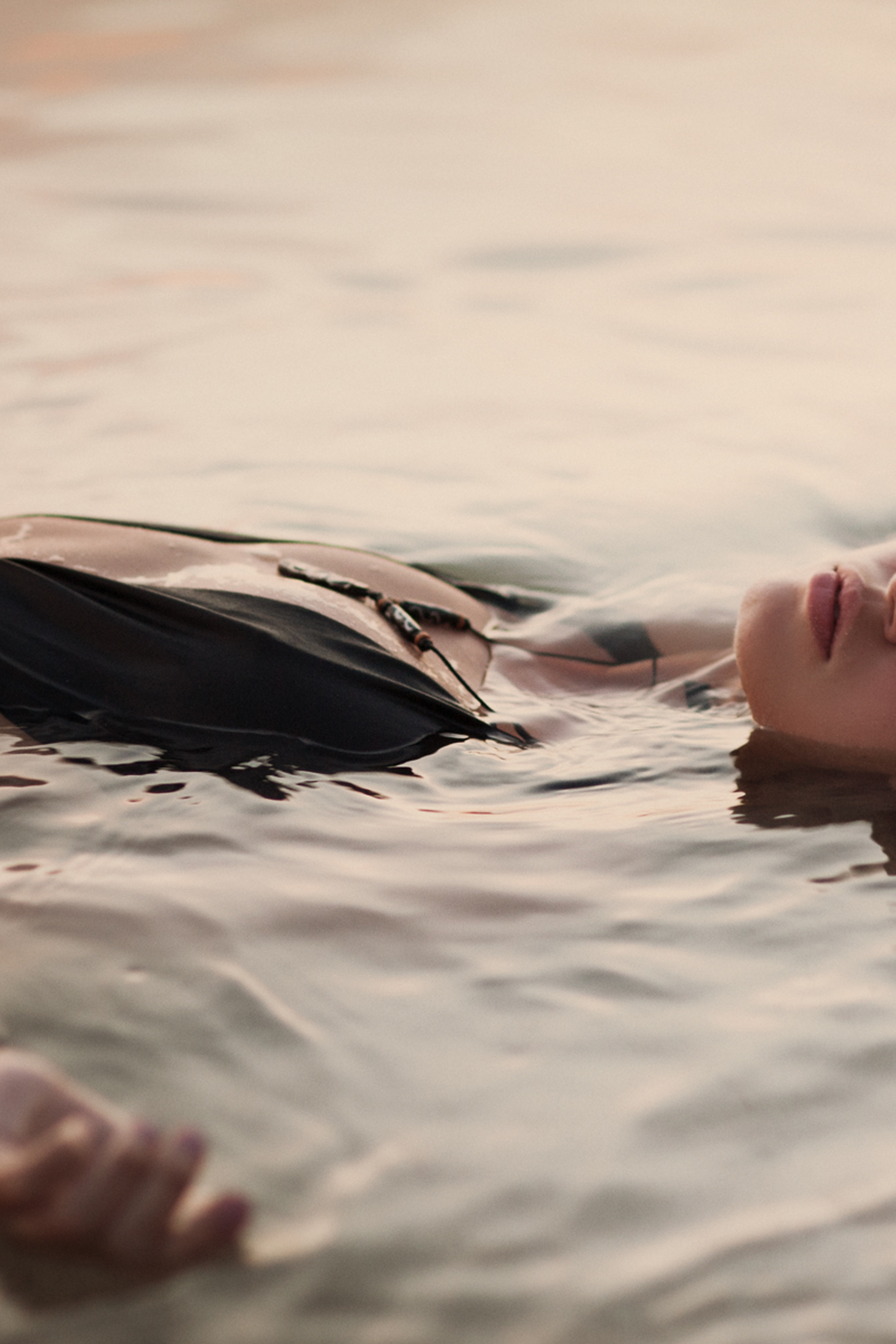 A young woman in the ocean