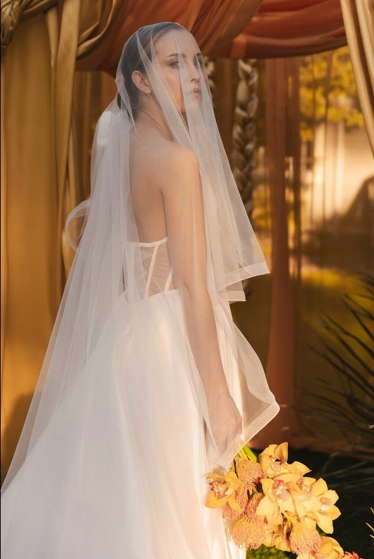 Cinematic wedding portrait with contemporary mood