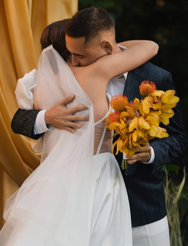 Cinematic wedding portrait with contemporary mood