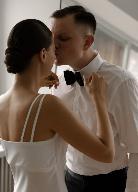 Candid couple moment with a luxury aesthetic